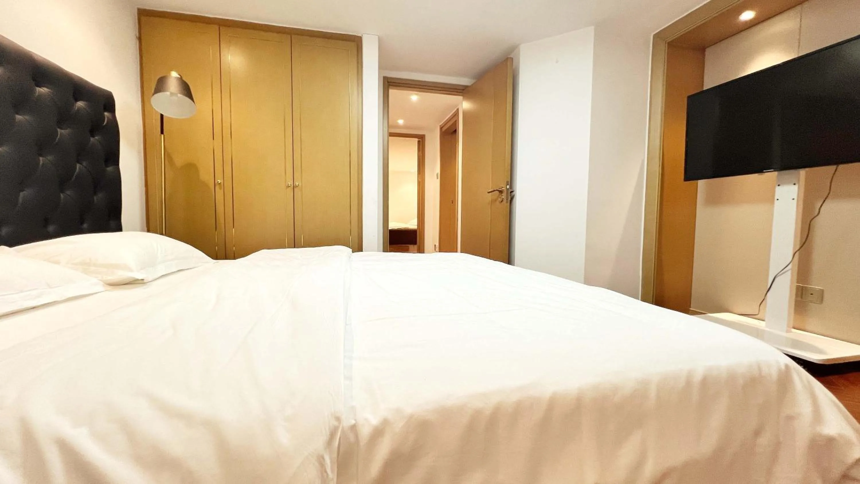 Bed in Hongqiao Aegean Sea LOFT Apartment