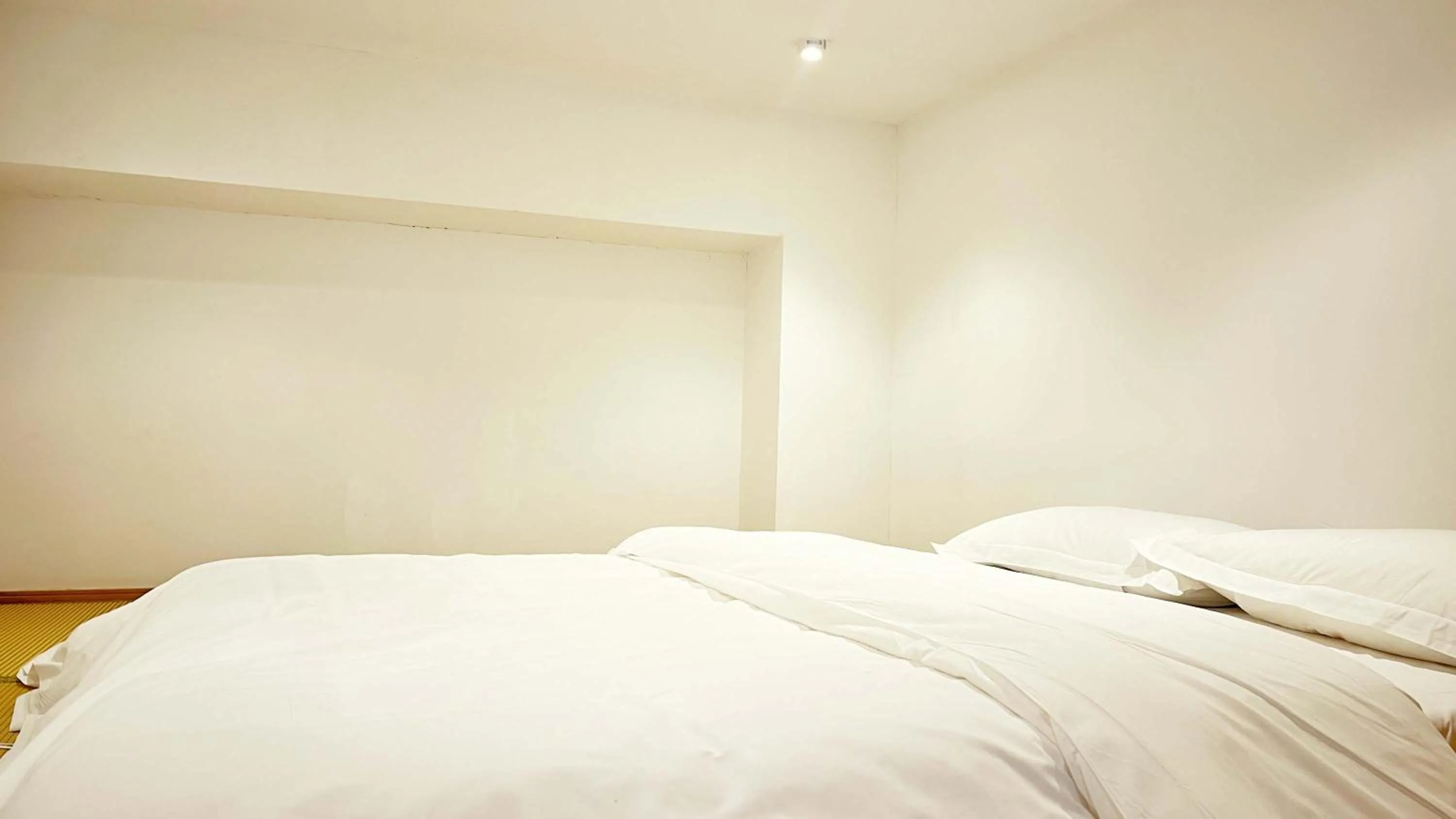 Bed in Hongqiao Aegean Sea LOFT Apartment