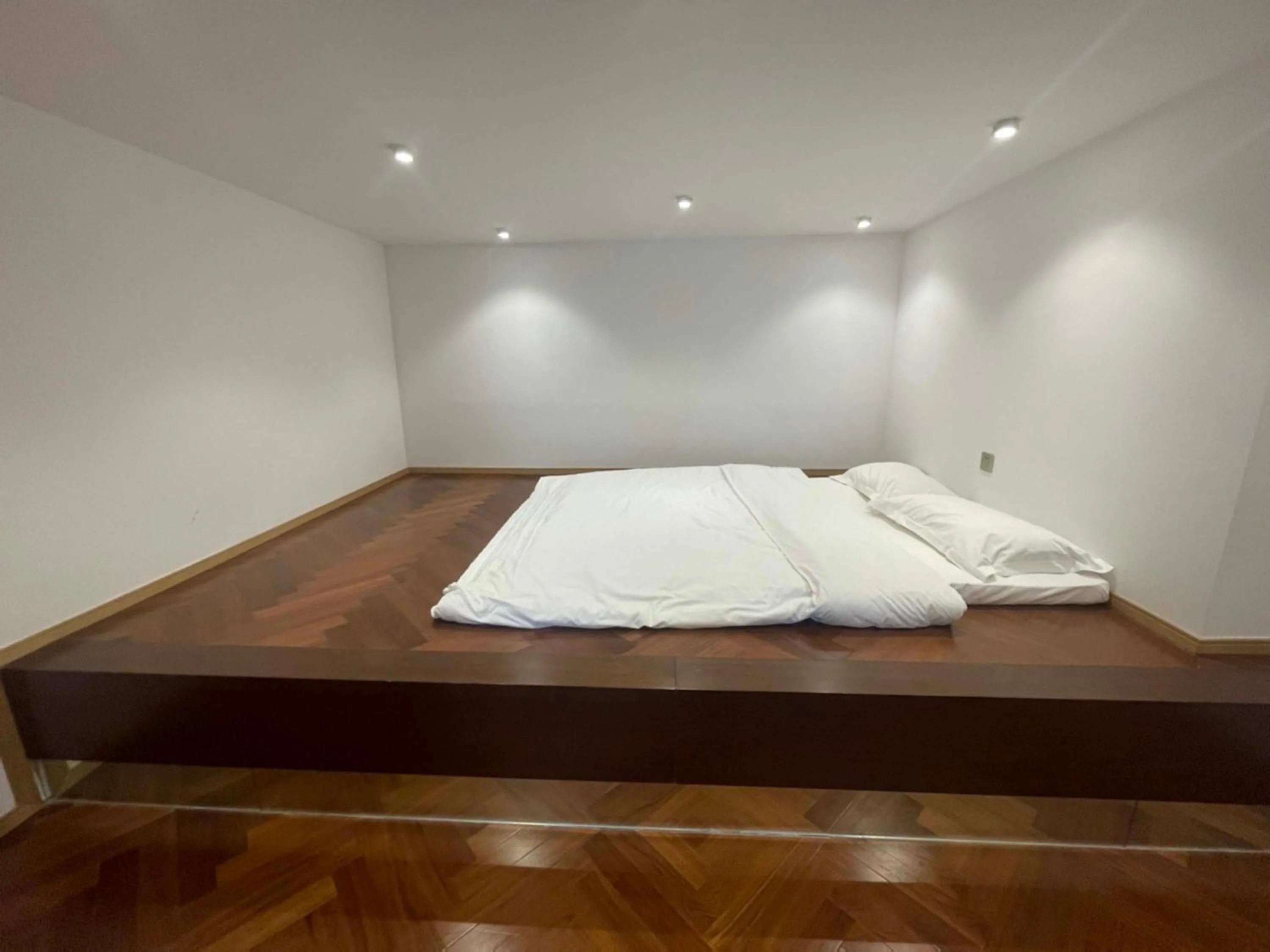 Bed in Hongqiao Aegean Sea LOFT Apartment