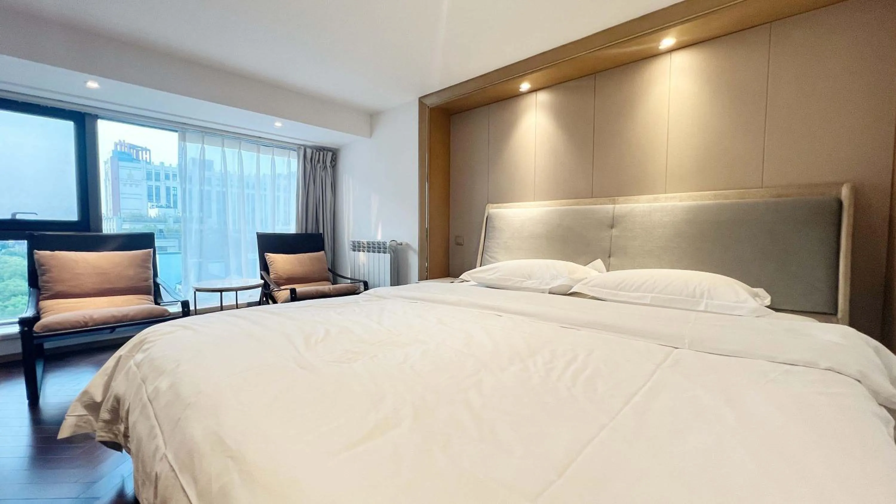 Photo of the whole room, Bed in Hongqiao Aegean Sea LOFT Apartment