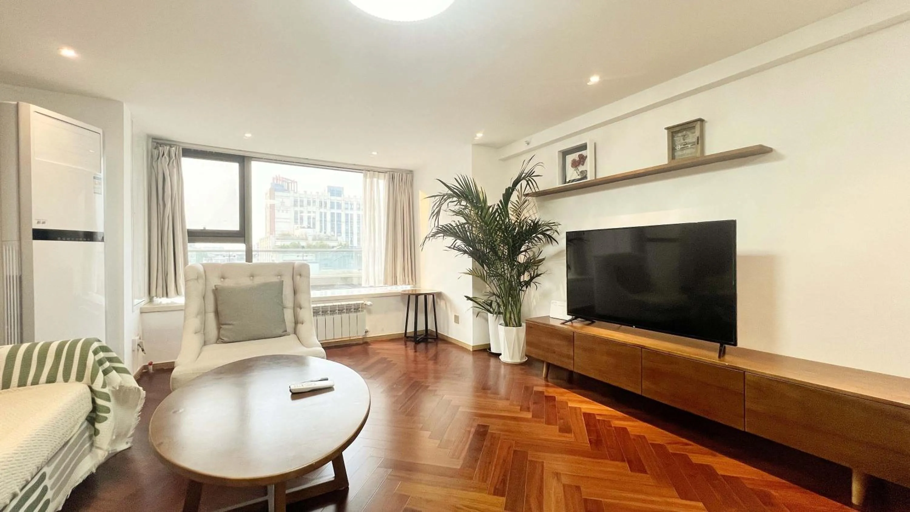 TV and multimedia in Hongqiao Aegean Sea LOFT Apartment
