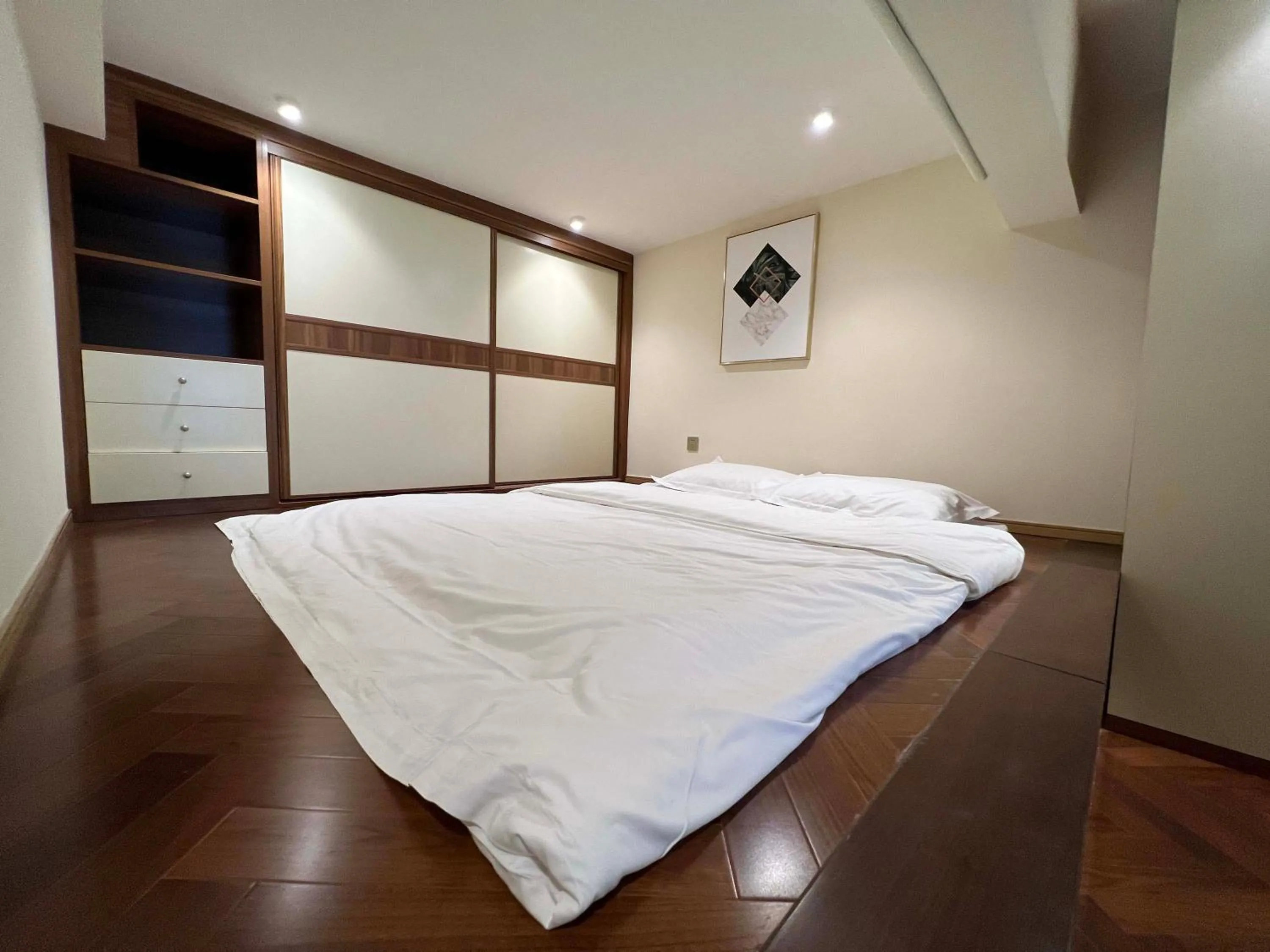 Bed in Hongqiao Aegean Sea LOFT Apartment