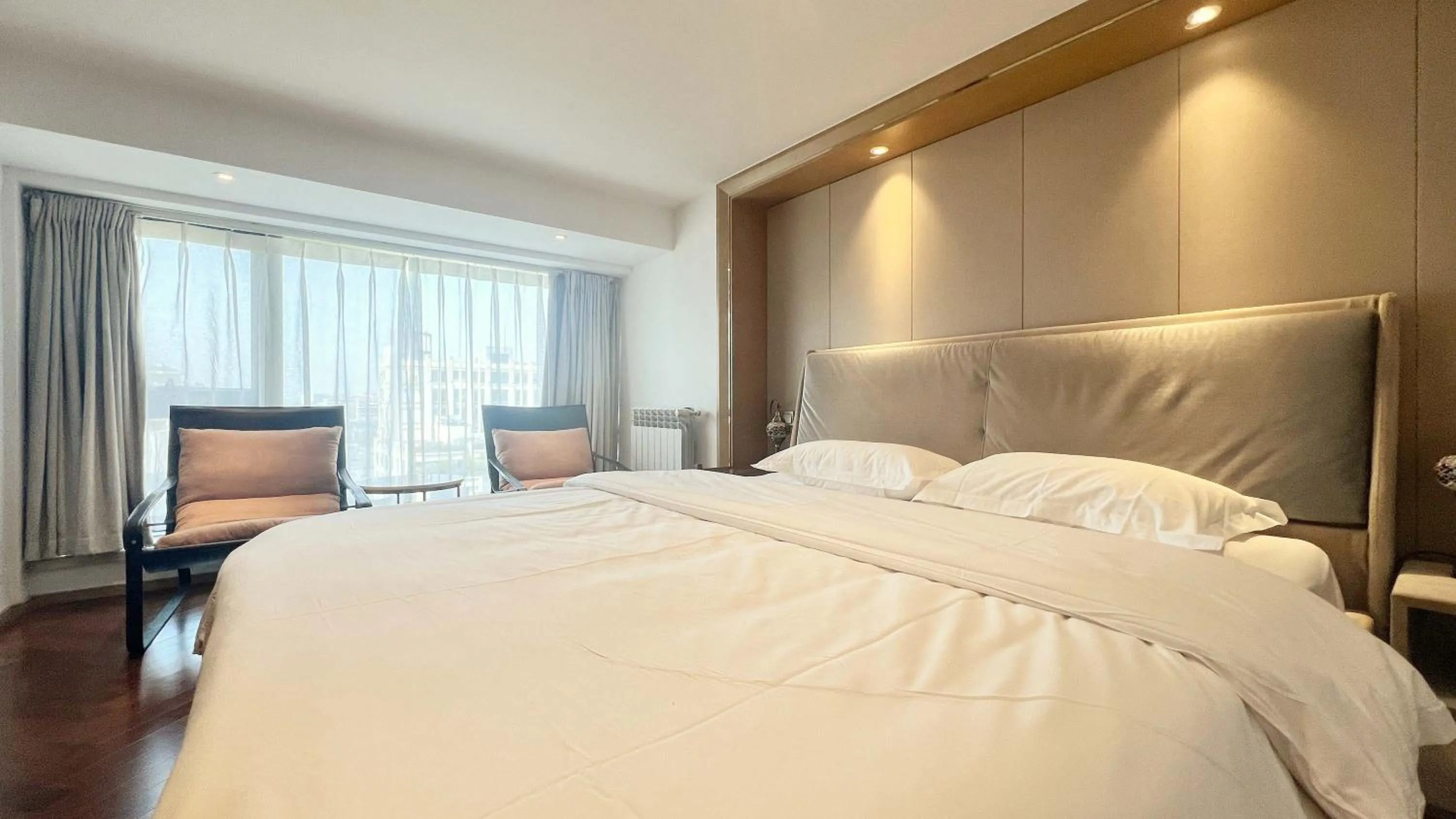 Bed in Hongqiao Aegean Sea LOFT Apartment