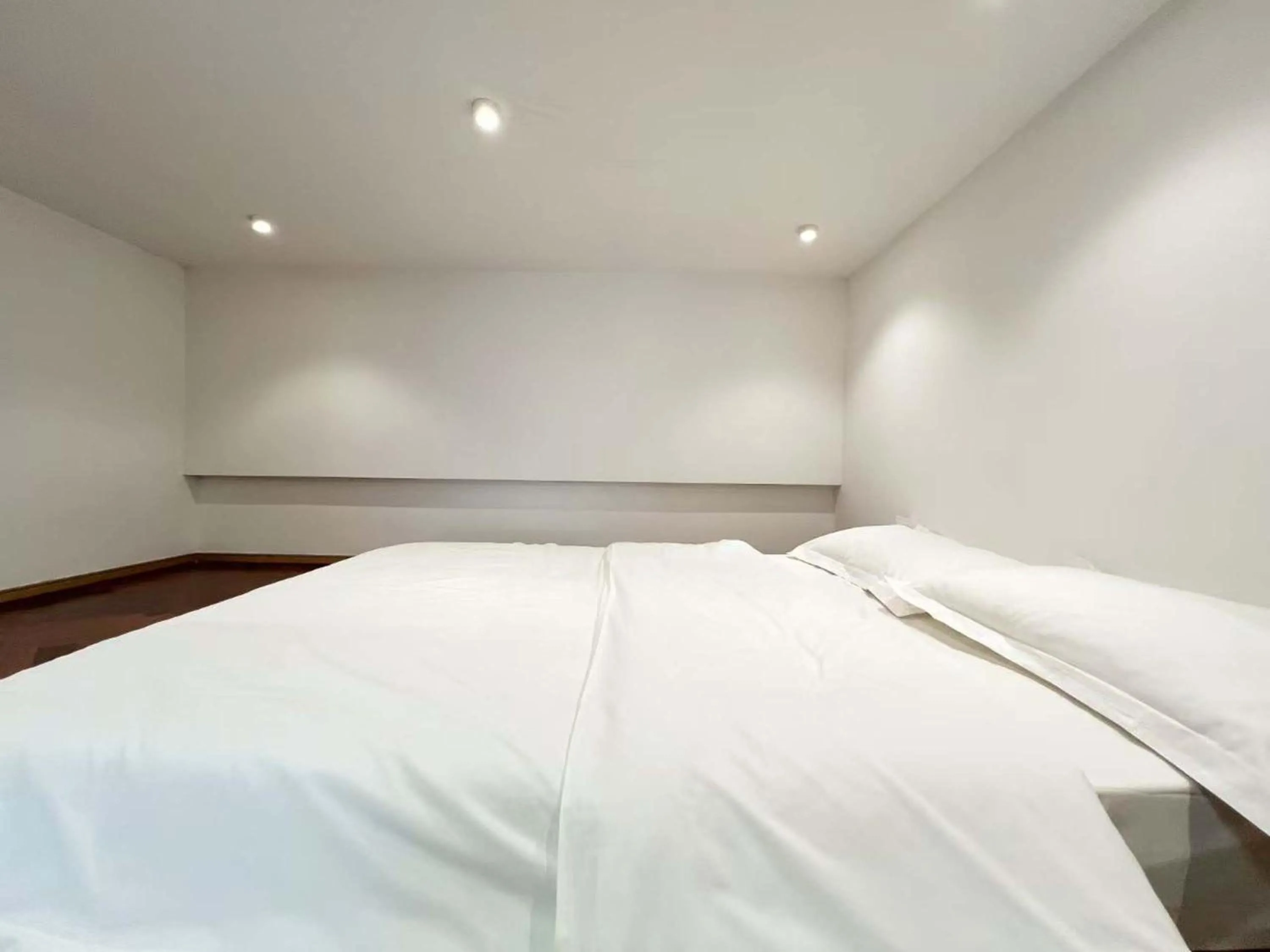 Bed in Hongqiao Aegean Sea LOFT Apartment