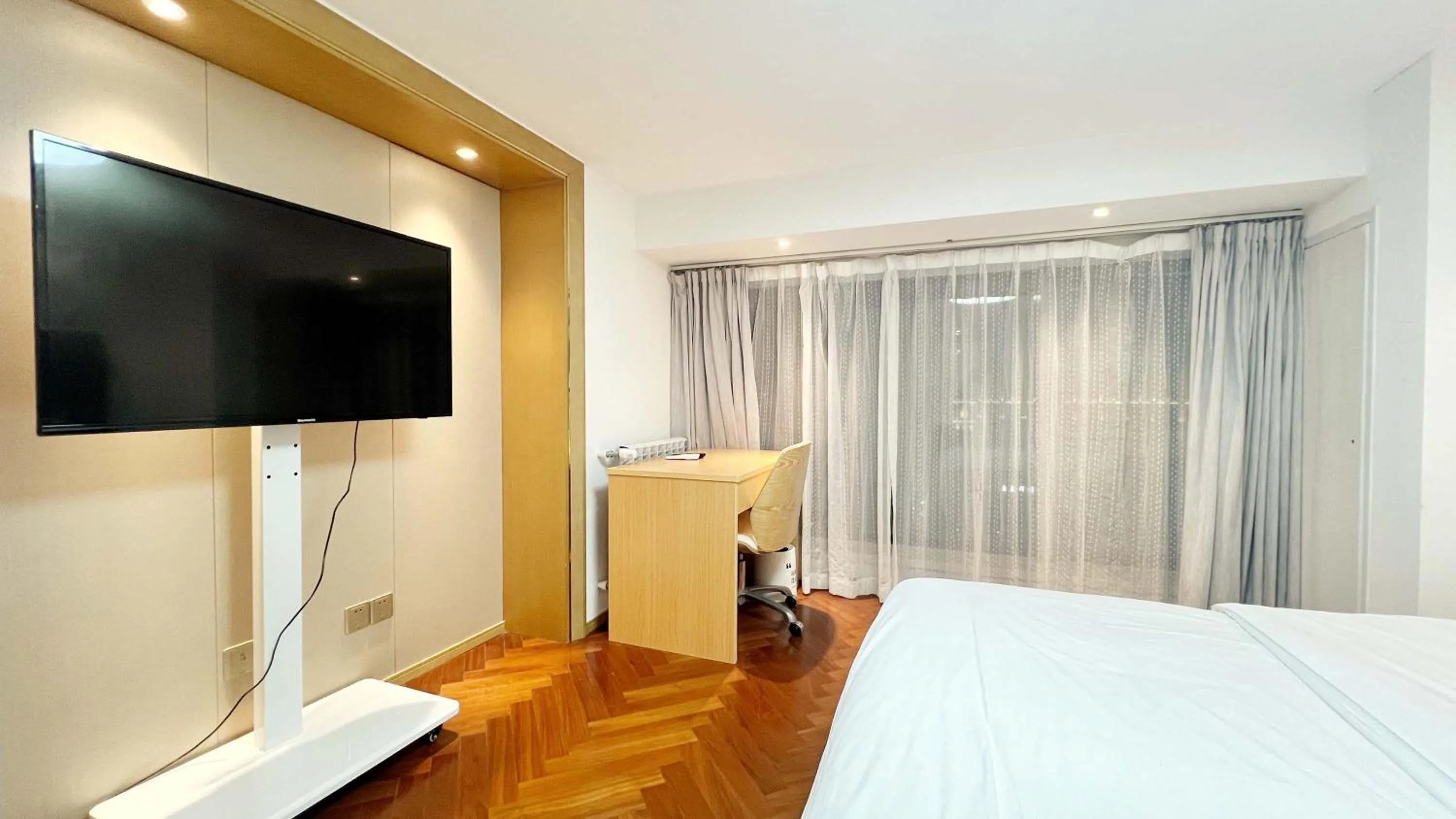 Bed in Hongqiao Aegean Sea LOFT Apartment