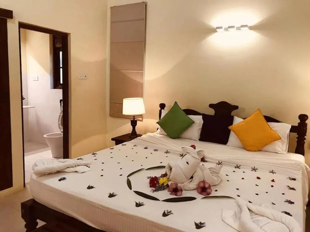 Bed in Lake View Bungalow Yala