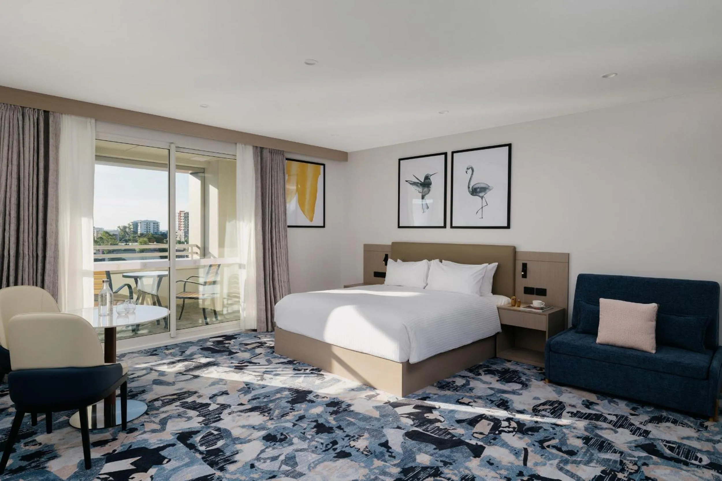 Photo of the whole room, Bed in voco Darwin Suites by IHG