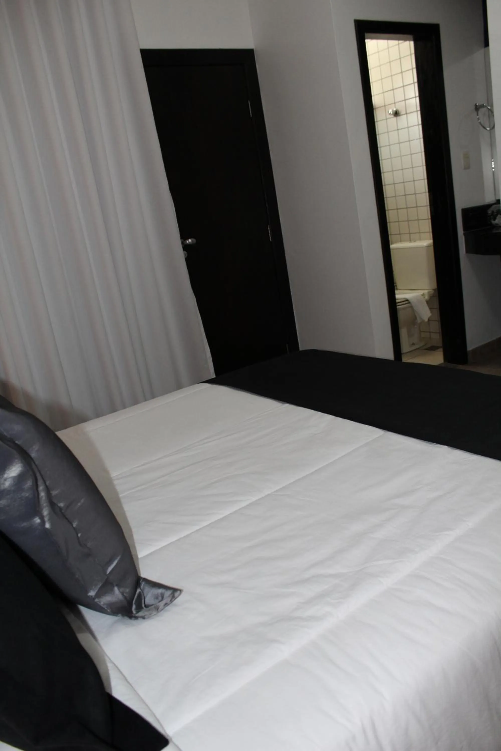 Bed in Hotel Dom Henrique