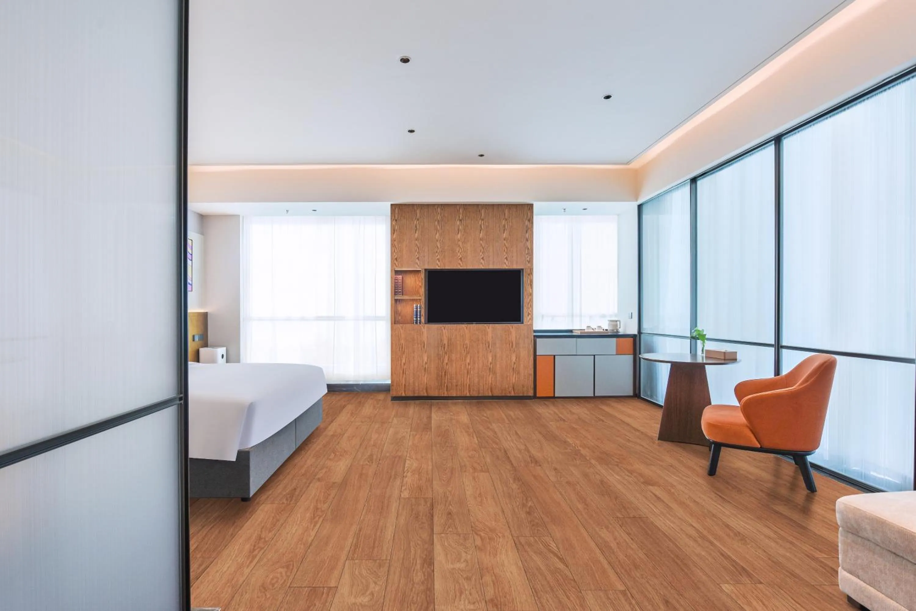 Living room, Bed in Novotel Jinan Airport