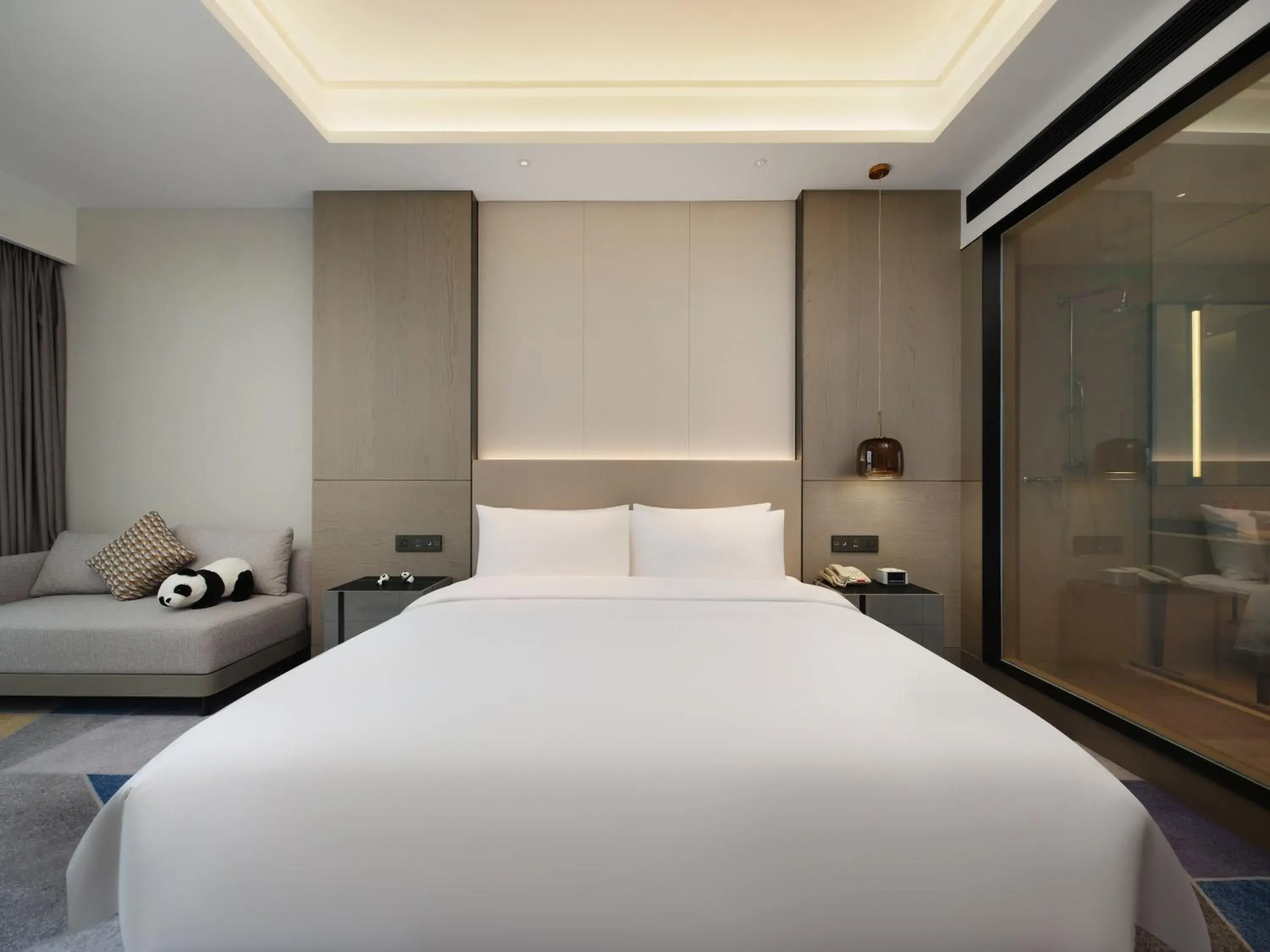 Bed in Crowne Plaza Dujiangyan by IHG Bed in Crowne Plaza Dujiangyan by IHG