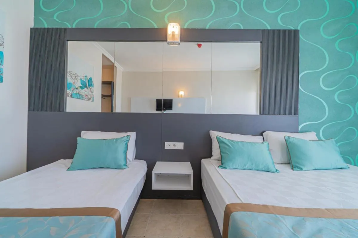 Bed in Club Sun Paradise Hotel