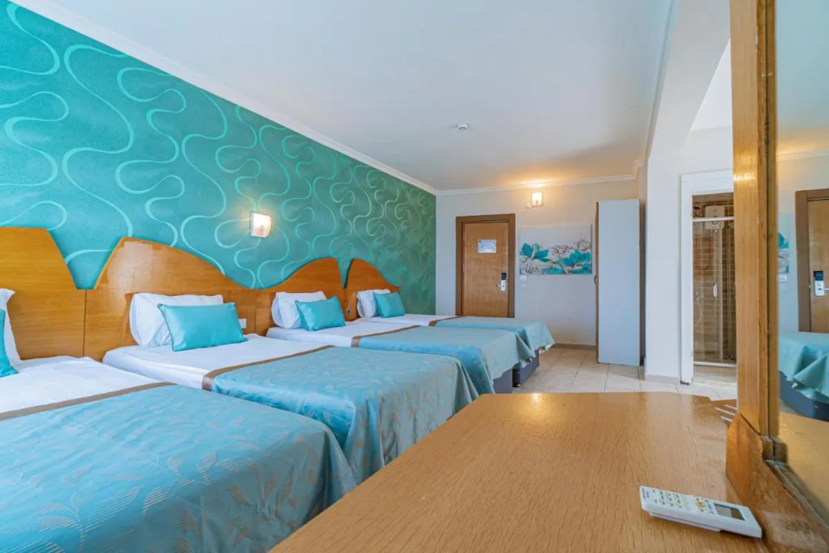 Bed in Club Sun Paradise Hotel