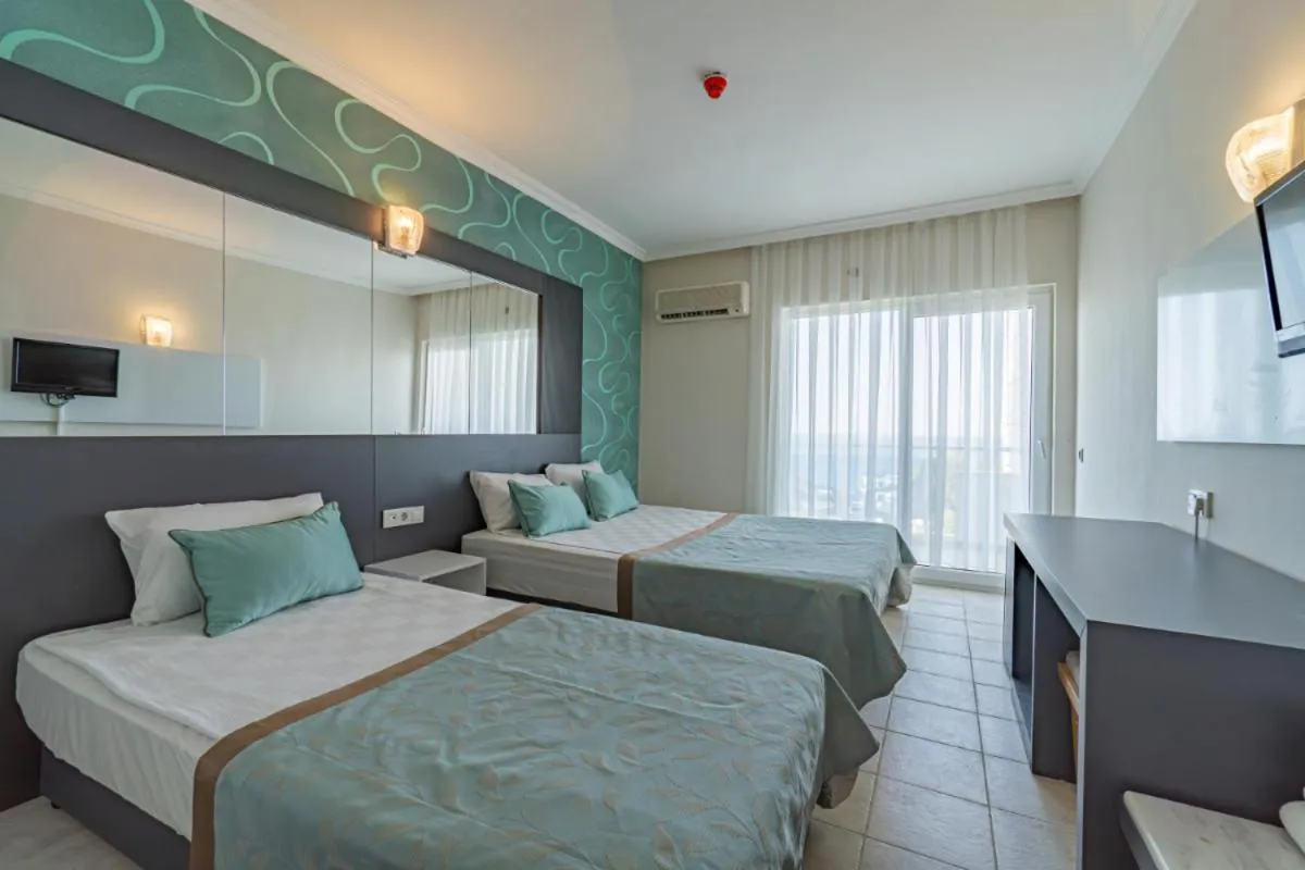 Bed in Club Sun Paradise Hotel