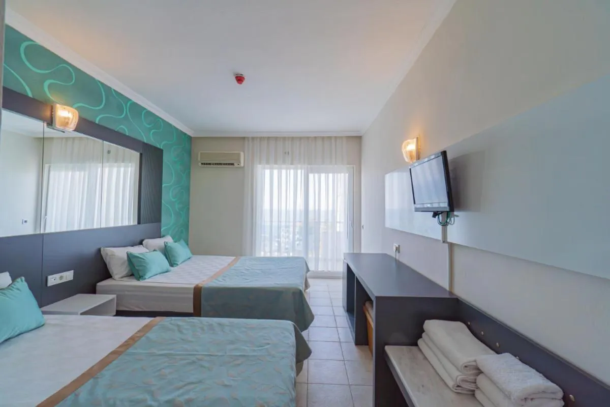 Bed in Club Sun Paradise Hotel