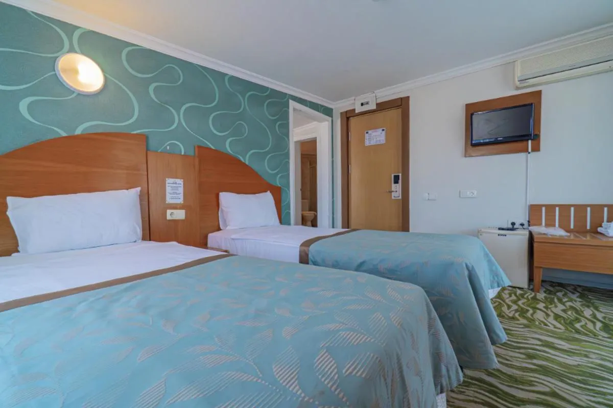 Bed in Club Sun Paradise Hotel