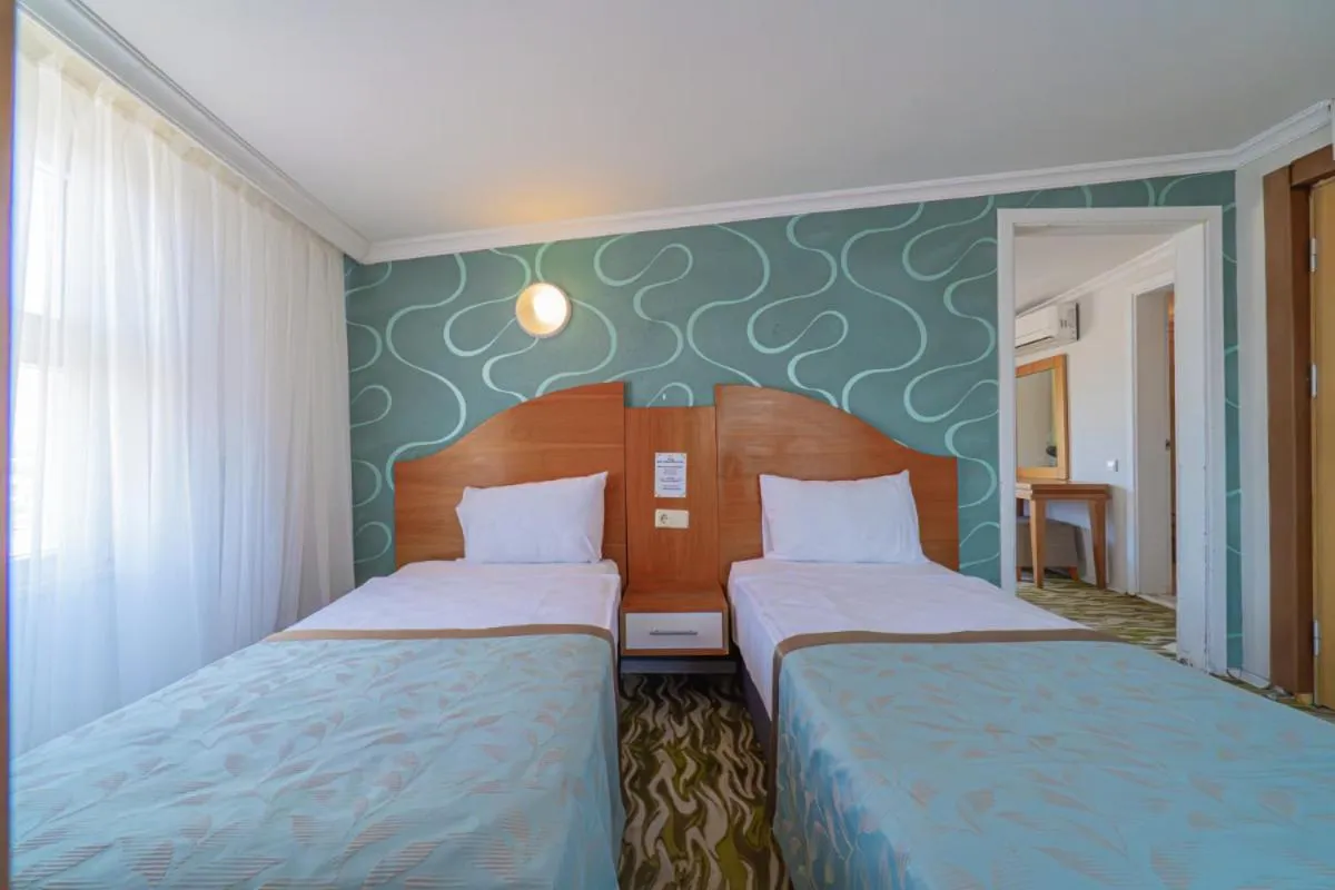 Bed in Club Sun Paradise Hotel