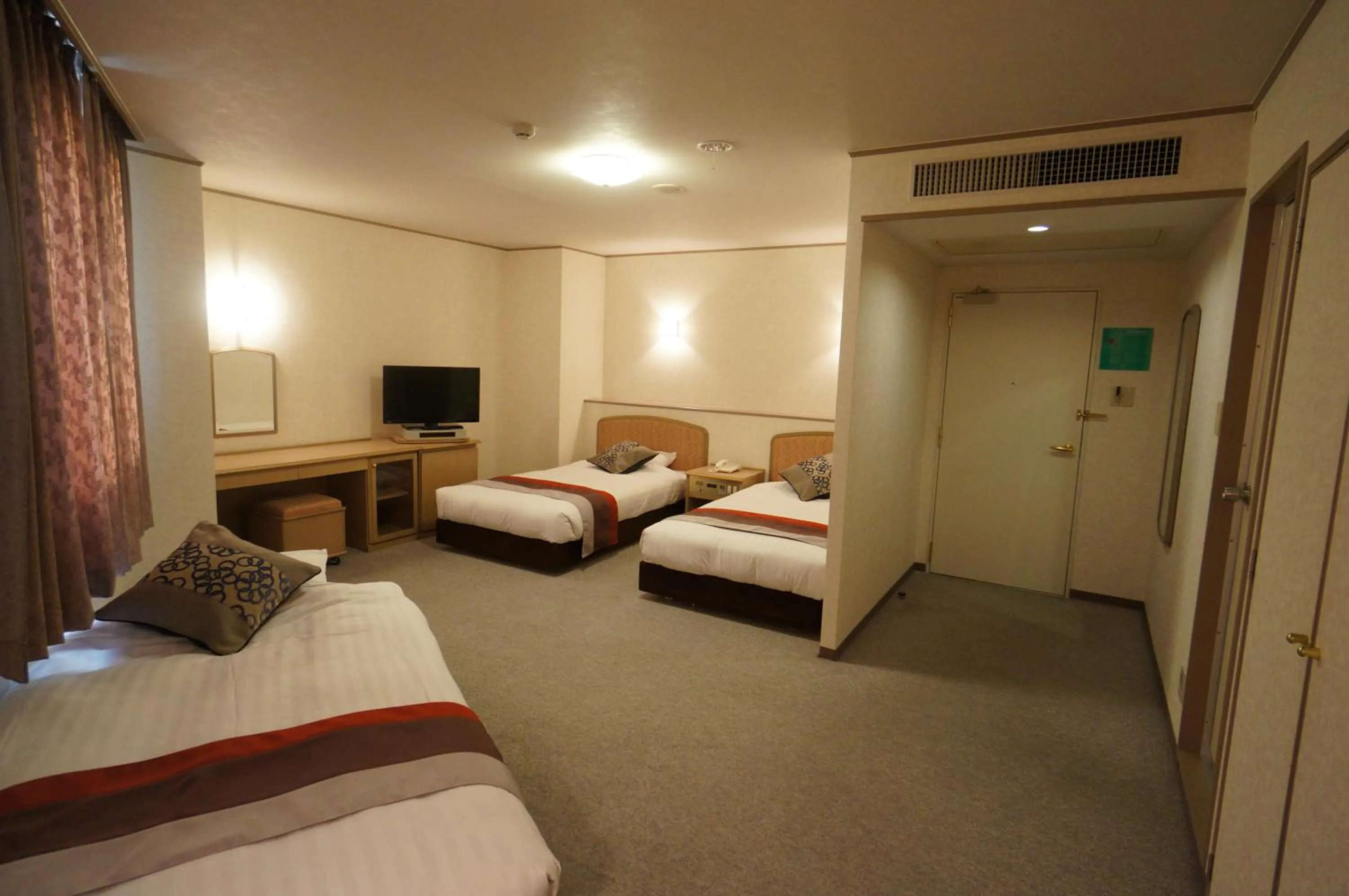 Bed in Hotel Areaone Hiroshima Wing