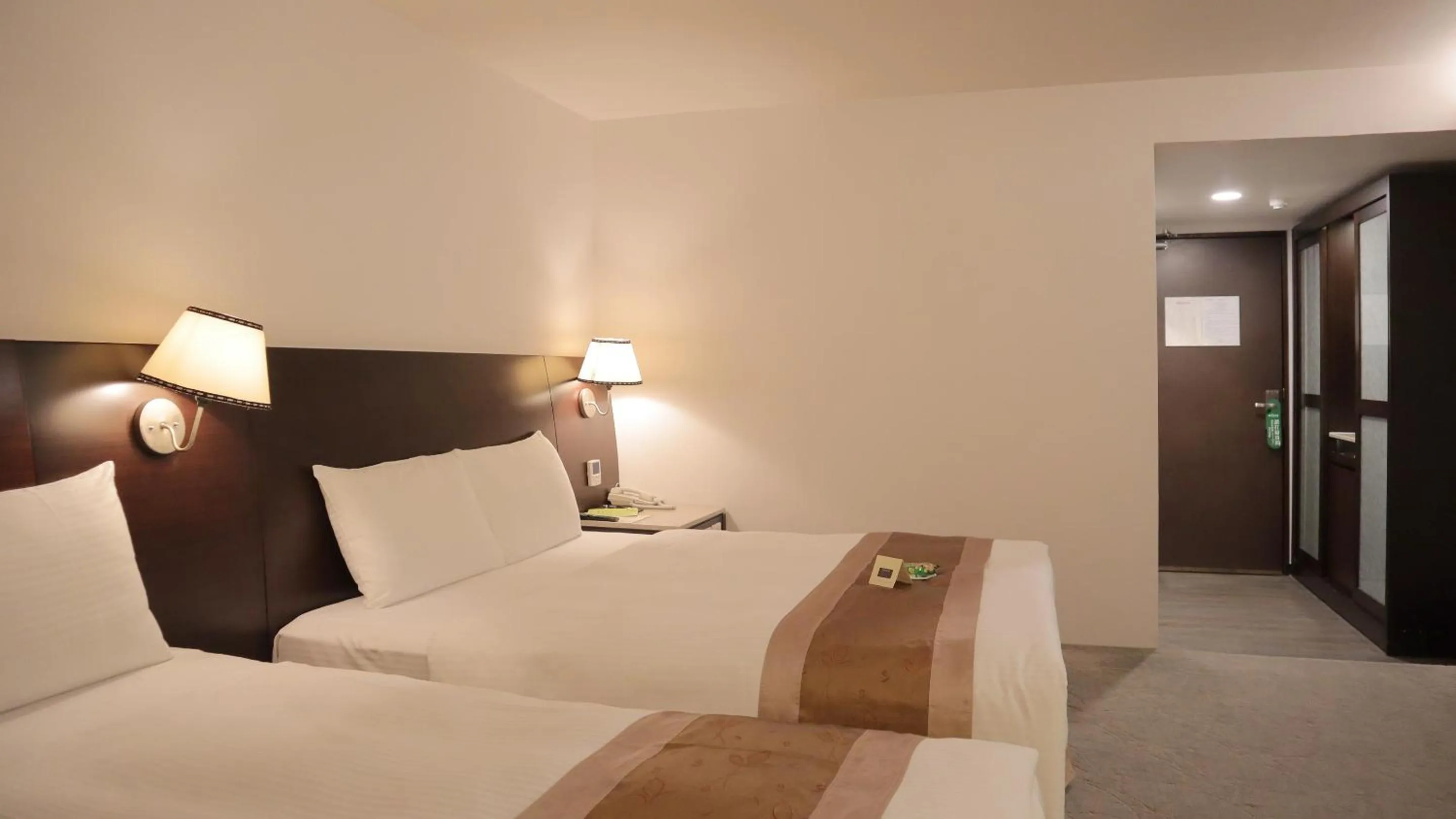 Bed in Ho Fong Business Stay