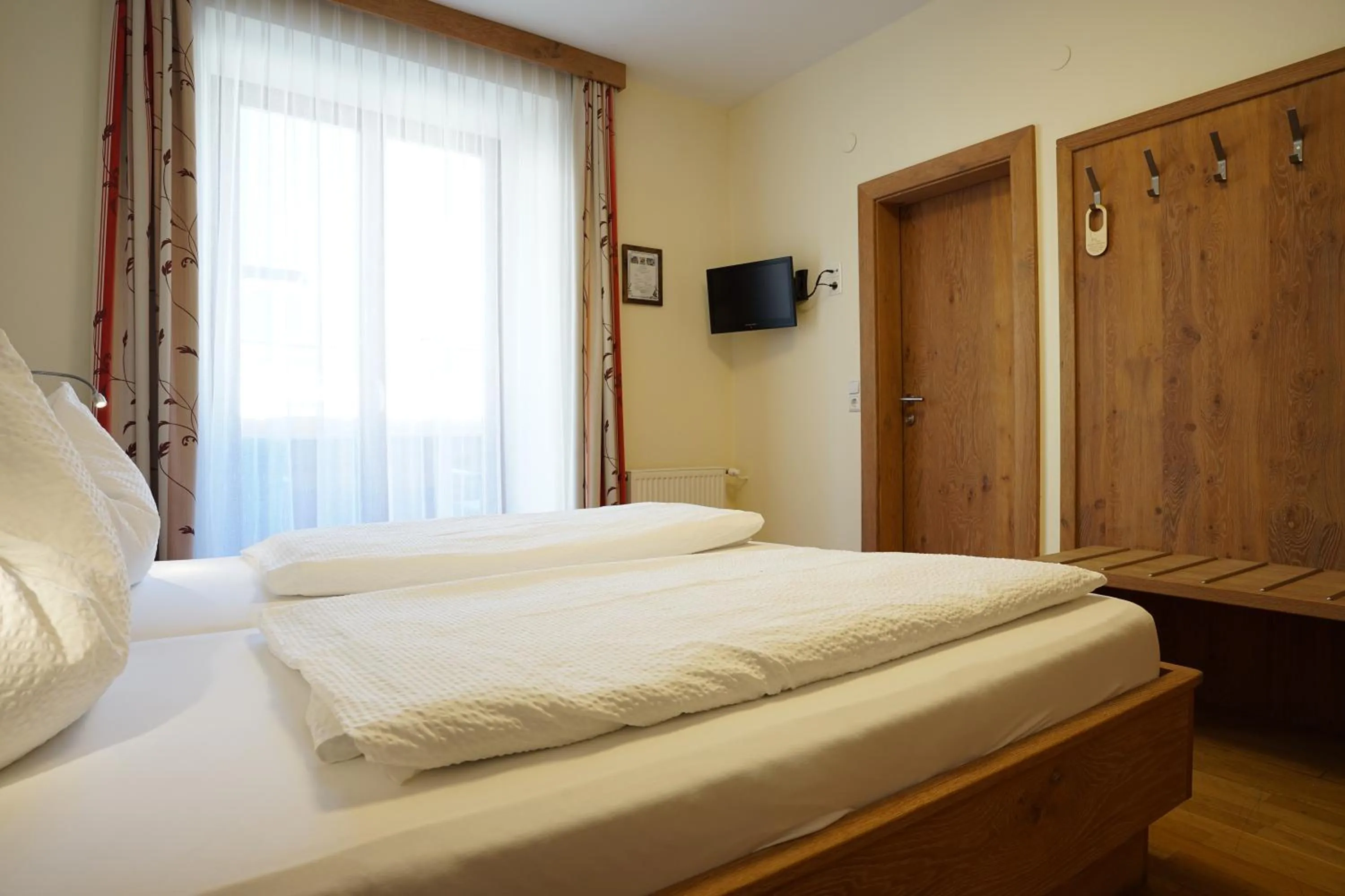 Bed in Gasthof-Fleischerei Engl
