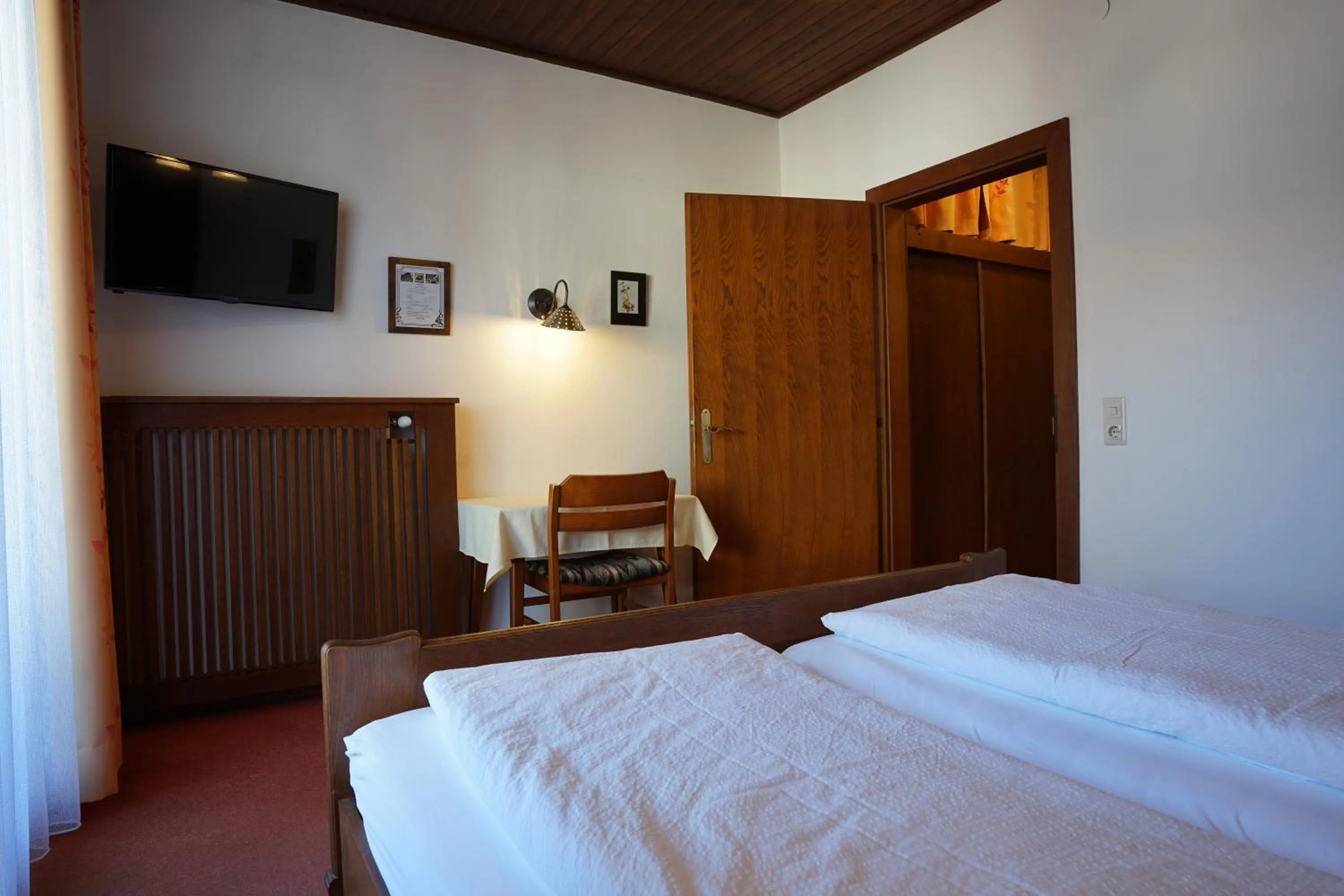 Bed in Gasthof-Fleischerei Engl