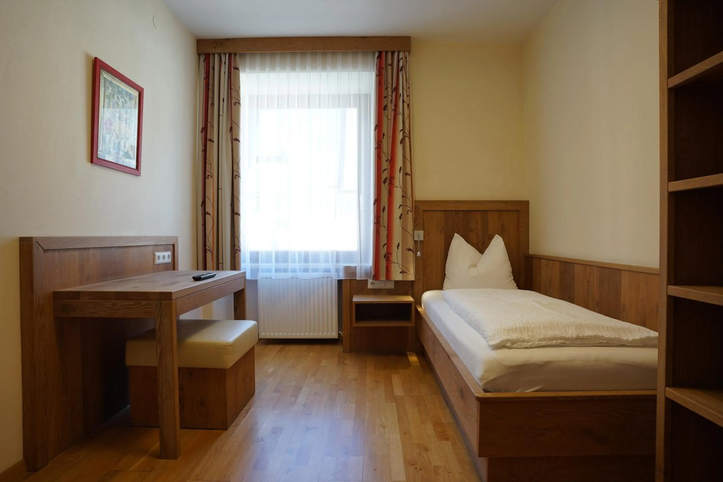 Bed in Gasthof-Fleischerei Engl