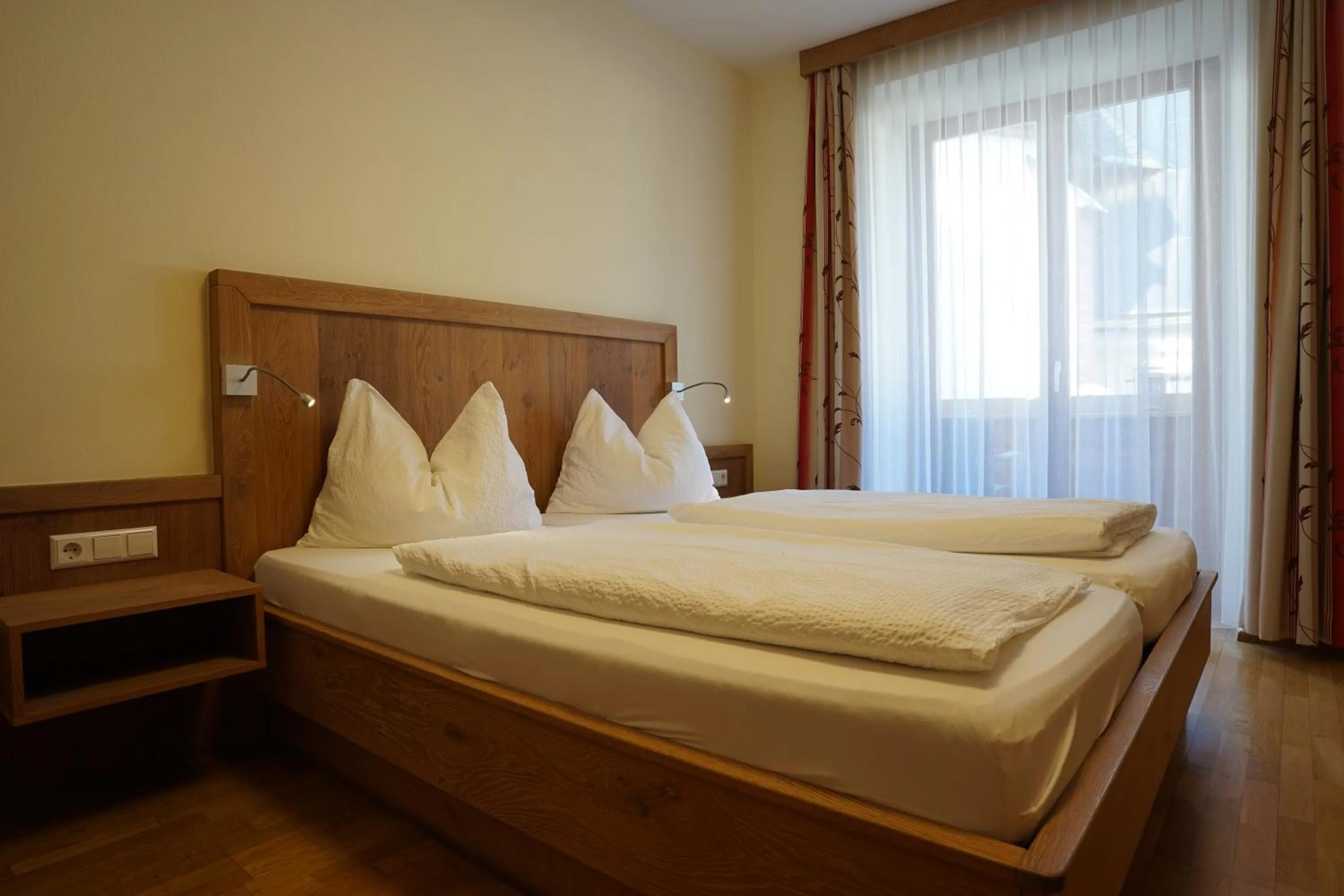 Bed in Gasthof-Fleischerei Engl