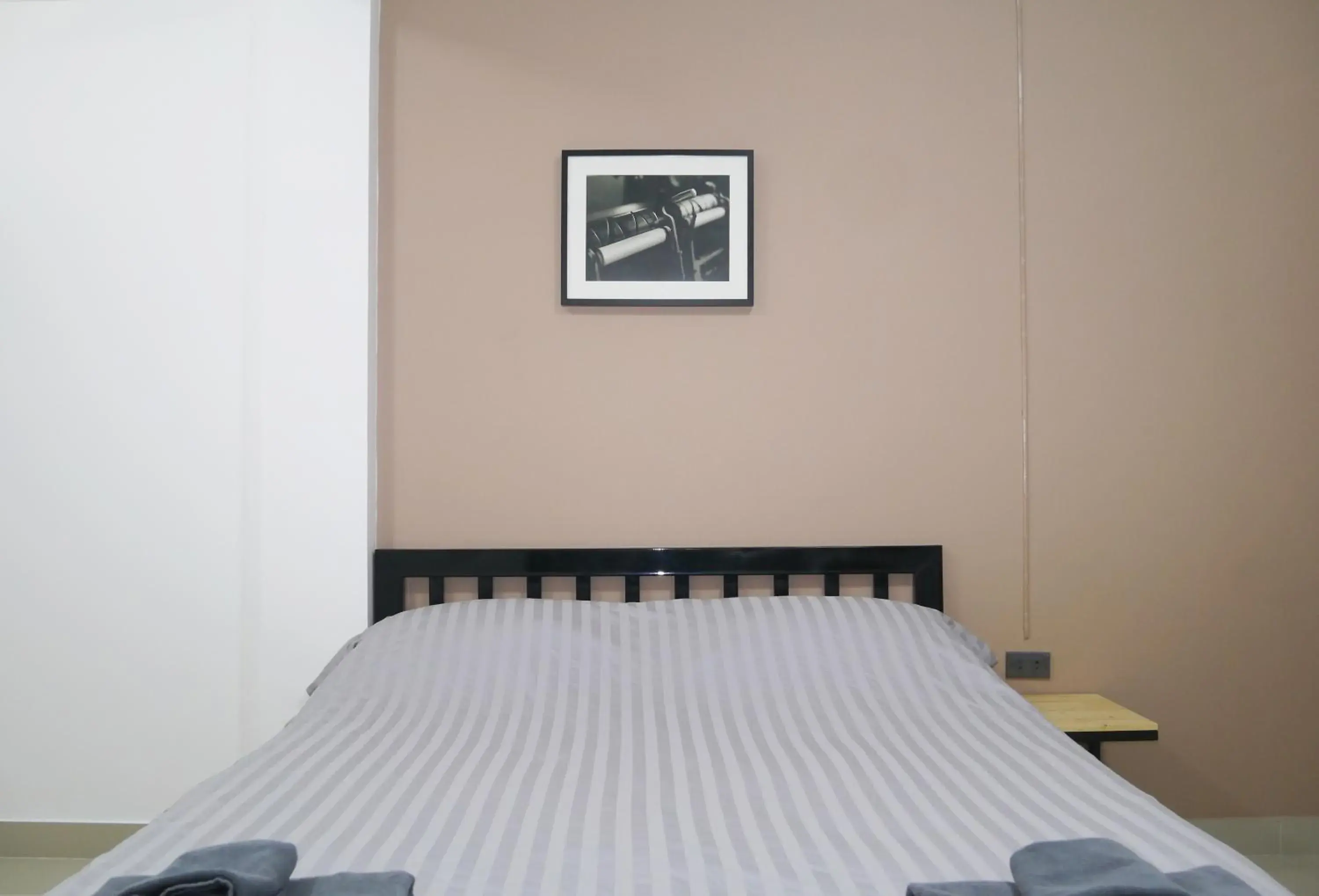 Decorative detail, Bed in Baan Mai Guest House Decorative detail, Bed in Baan Mai Guest House