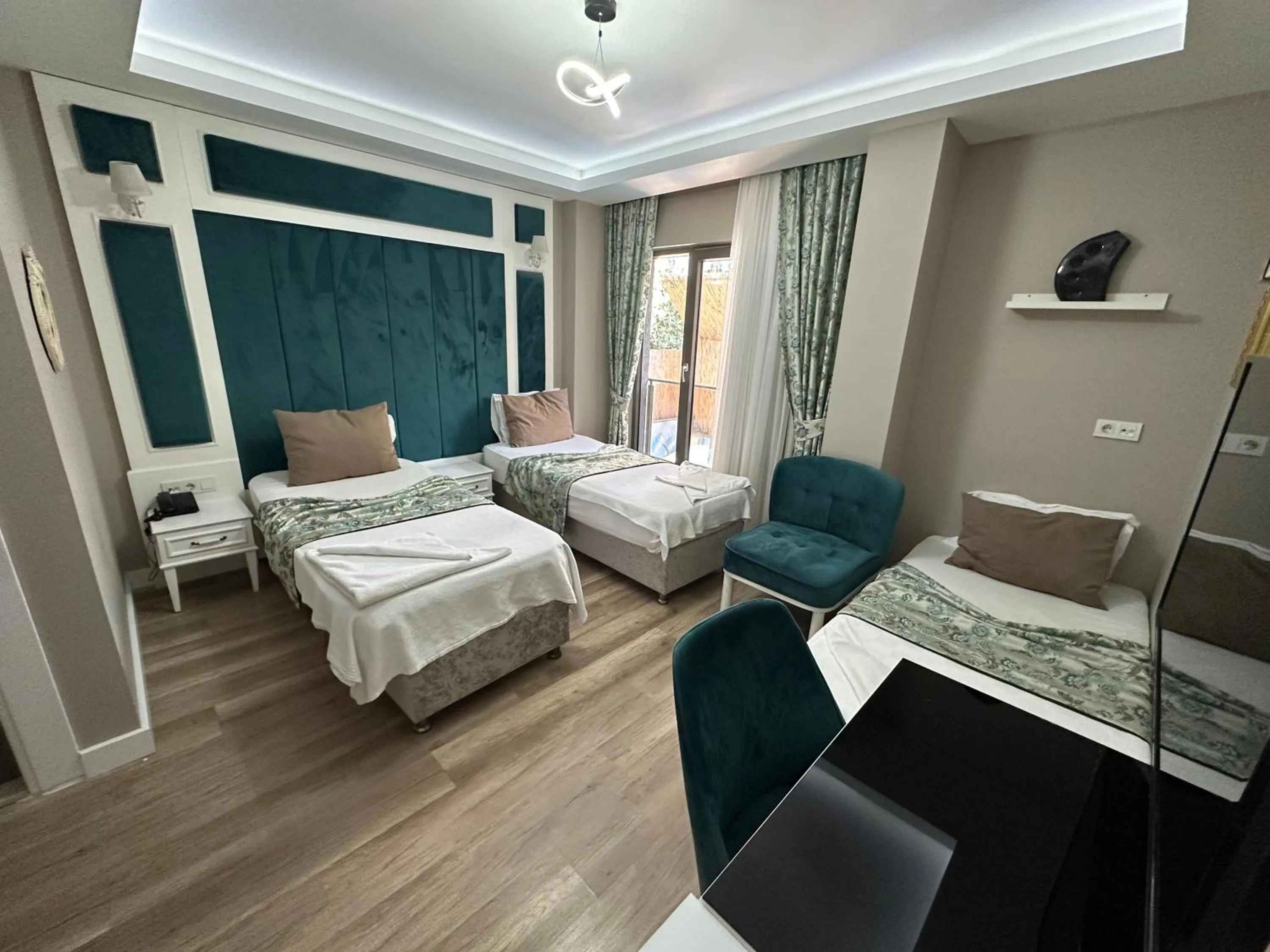 Photo of the whole room, Bed in Microyal Hotel