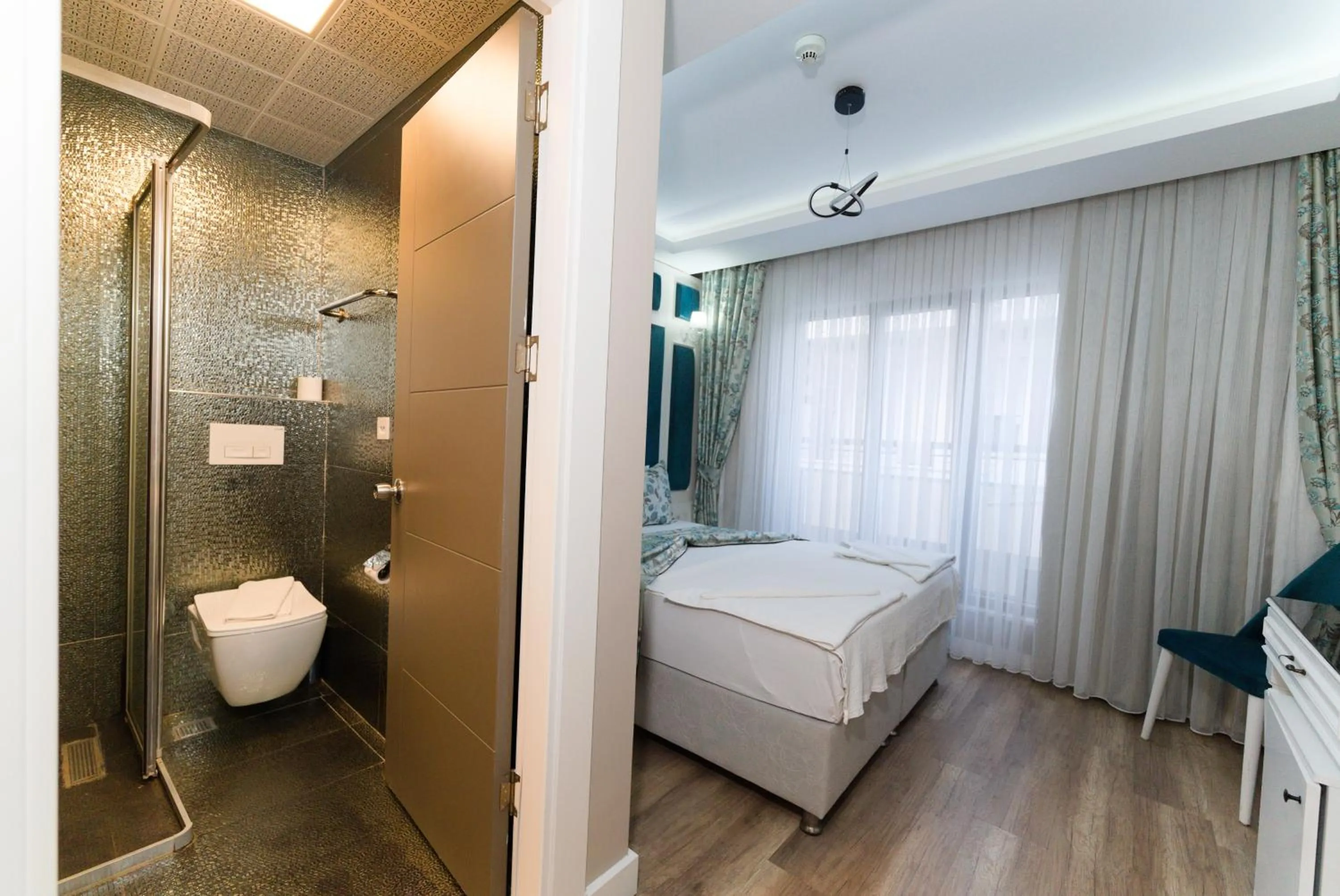 Photo of the whole room, Bed in Microyal Hotel