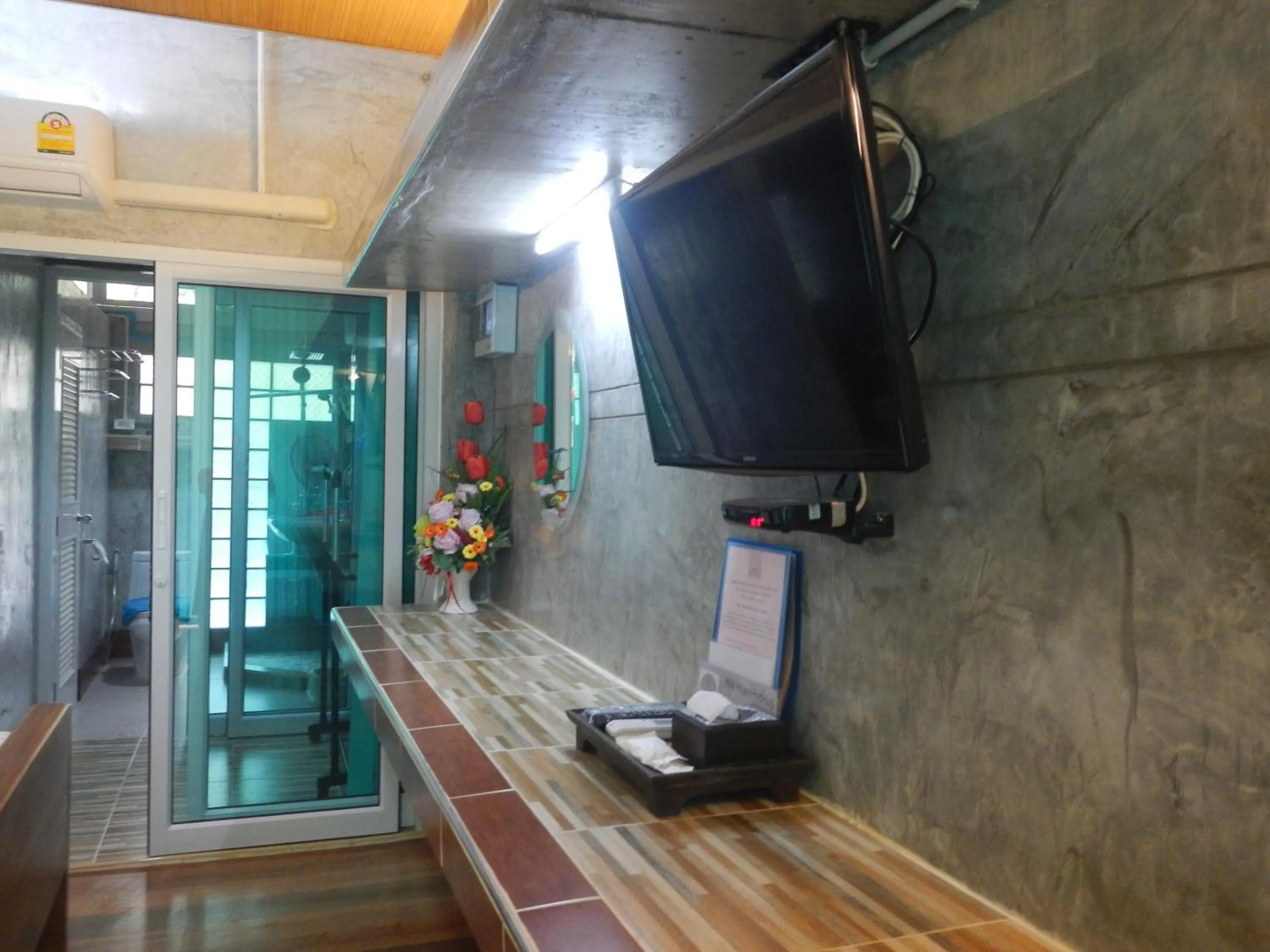 TV and multimedia in Loei Huen Hao Hug Home&Resort