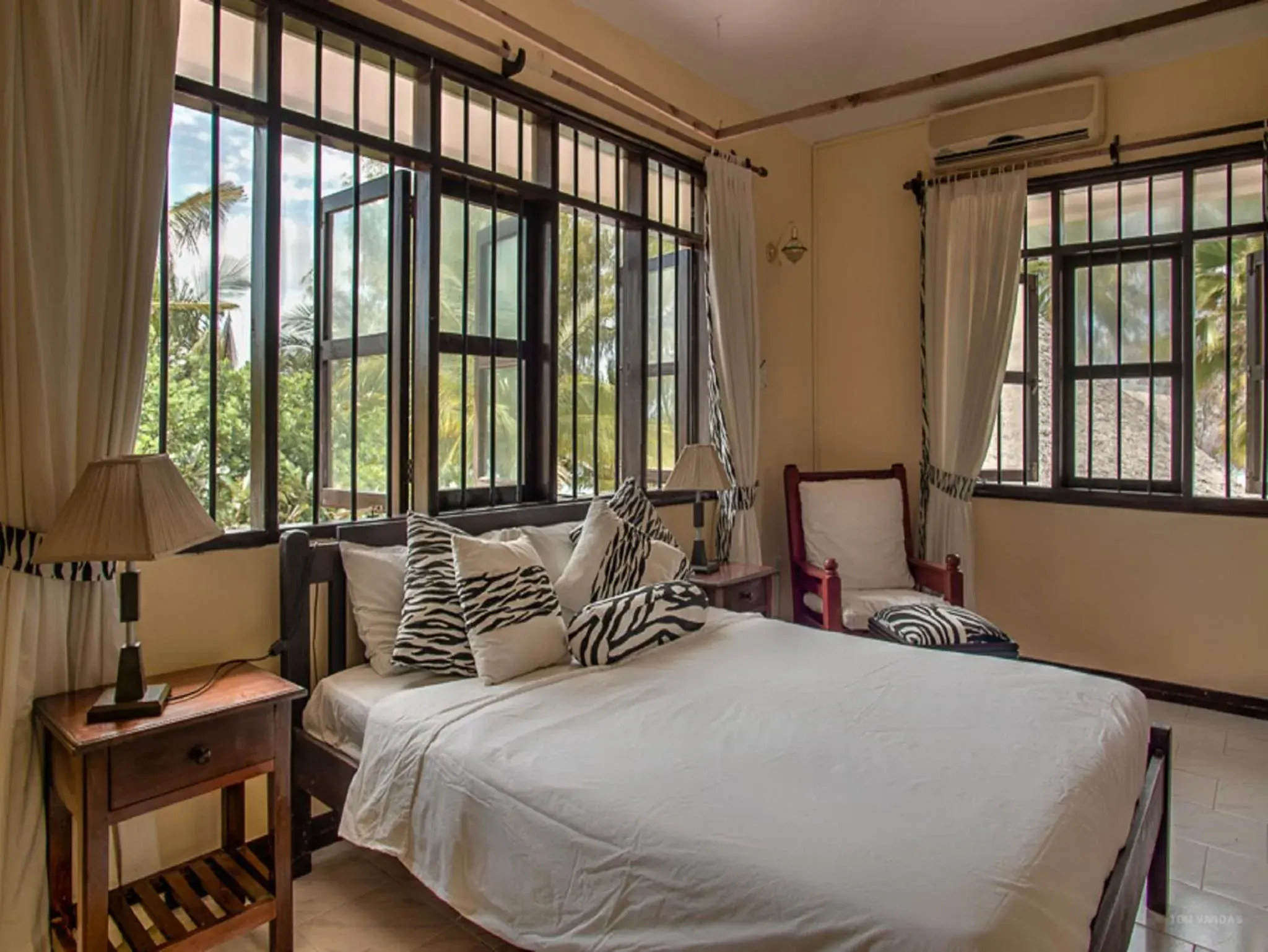 Bed in Bahari Dhow Beach Villas Bed in Bahari Dhow Beach Villas