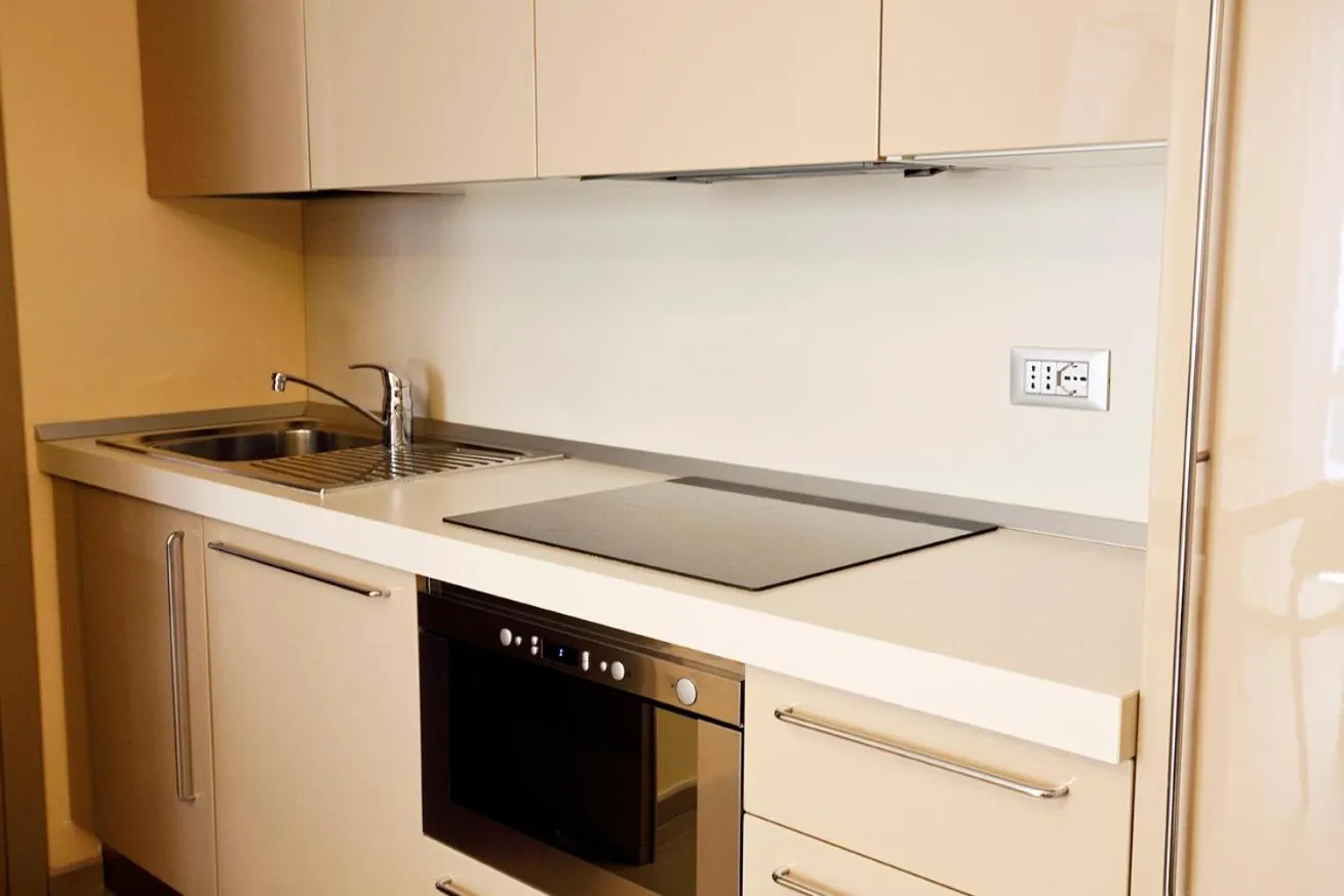 Kitchen or kitchenette in Residence Sole Mare Alaxi Hotels