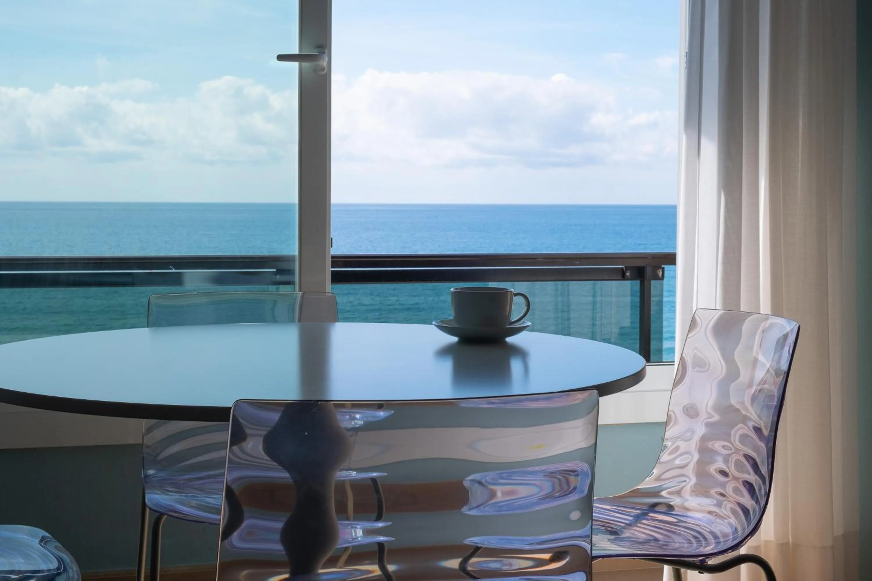 Seating area in Residence Sole Mare Alaxi Hotels