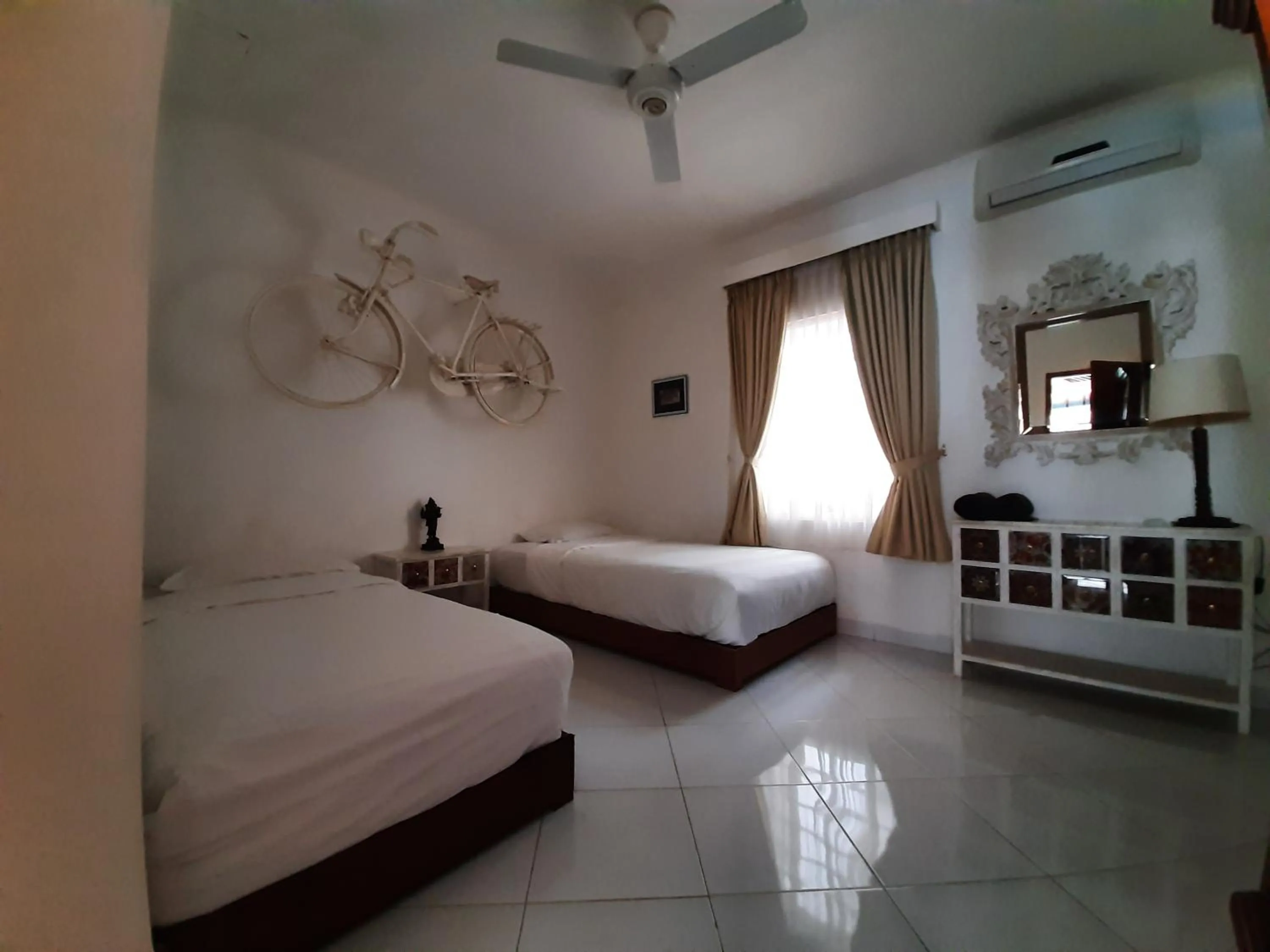 Bed in Yogyakarta Tropicana Villa