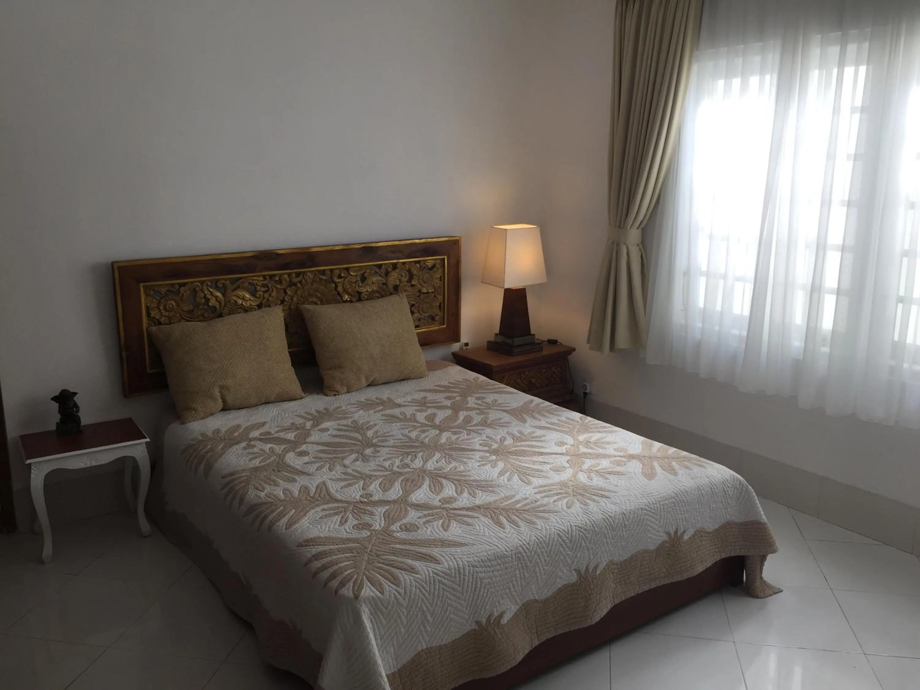 Bed in Yogyakarta Tropicana Villa