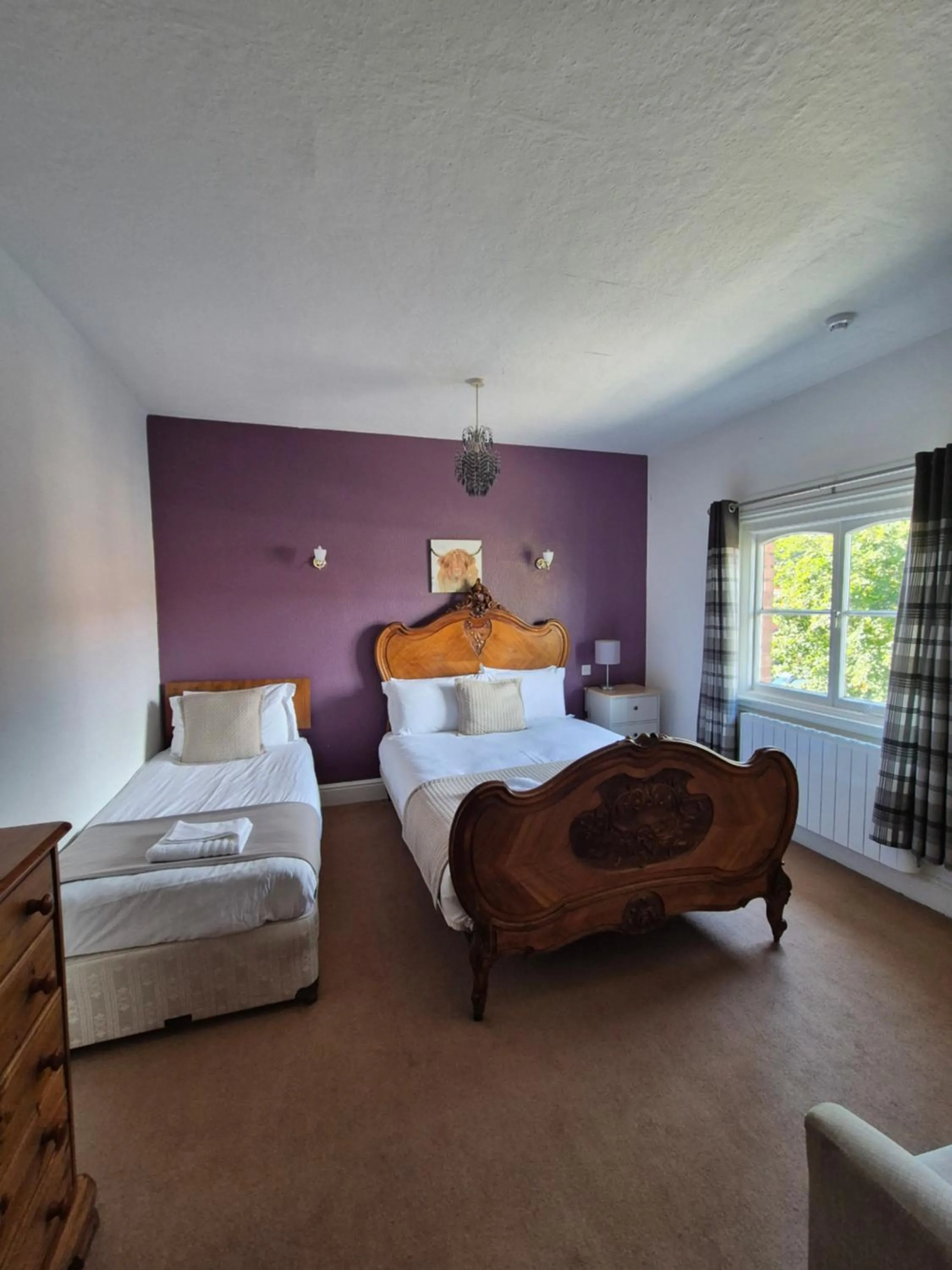 Bed in The Stokesay Inn