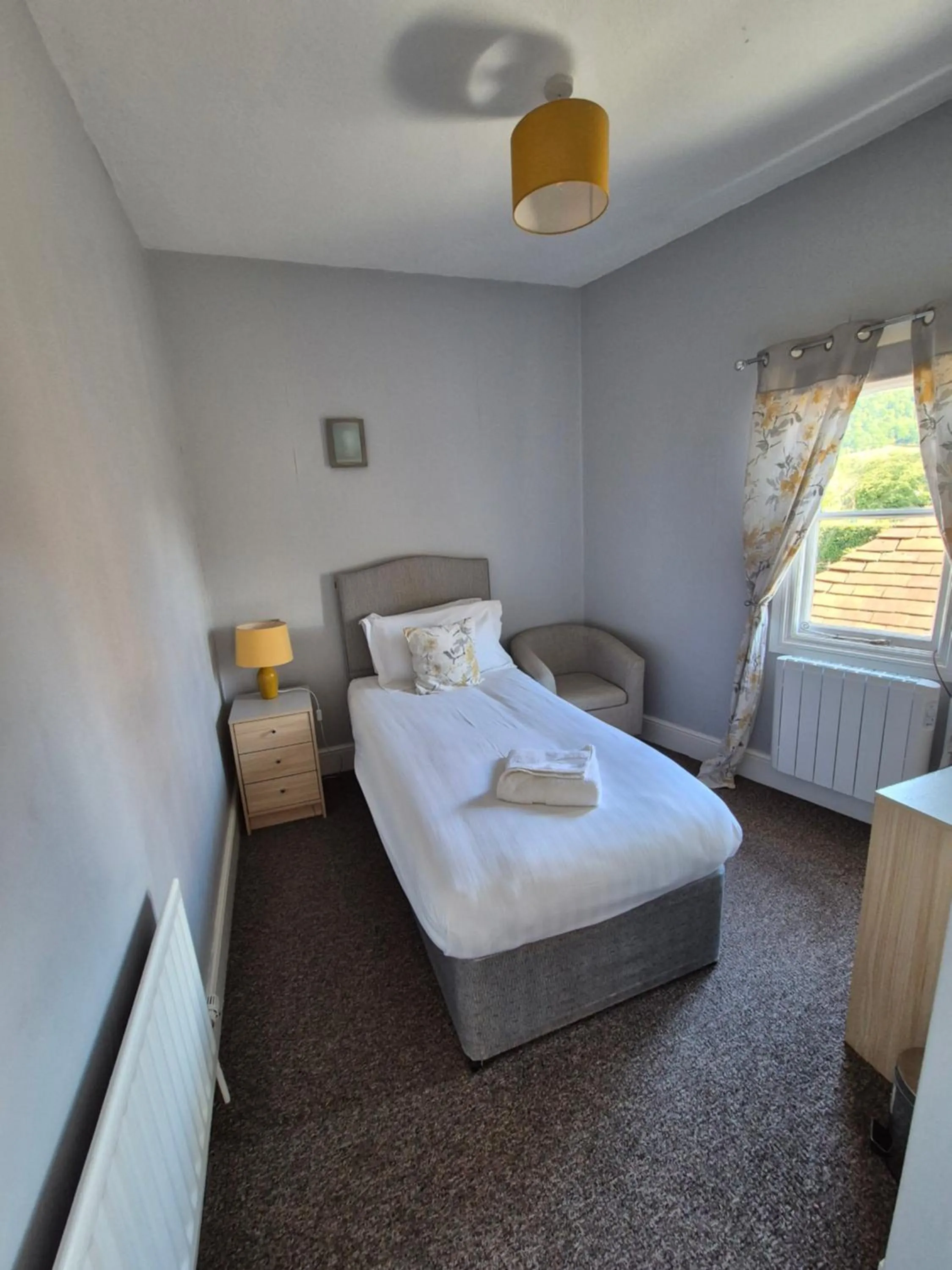 Bed in The Stokesay Inn