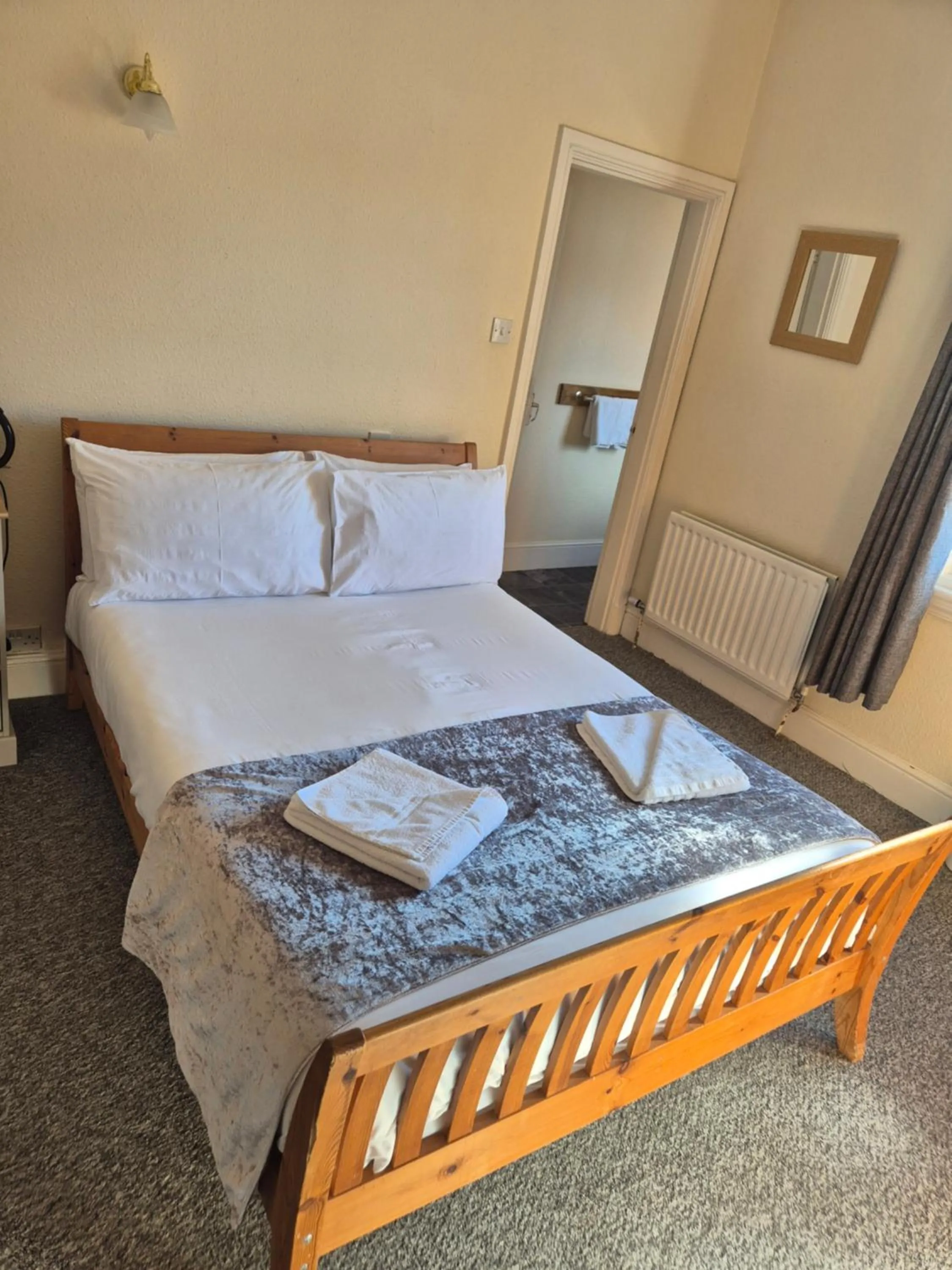 Bed in The Stokesay Inn