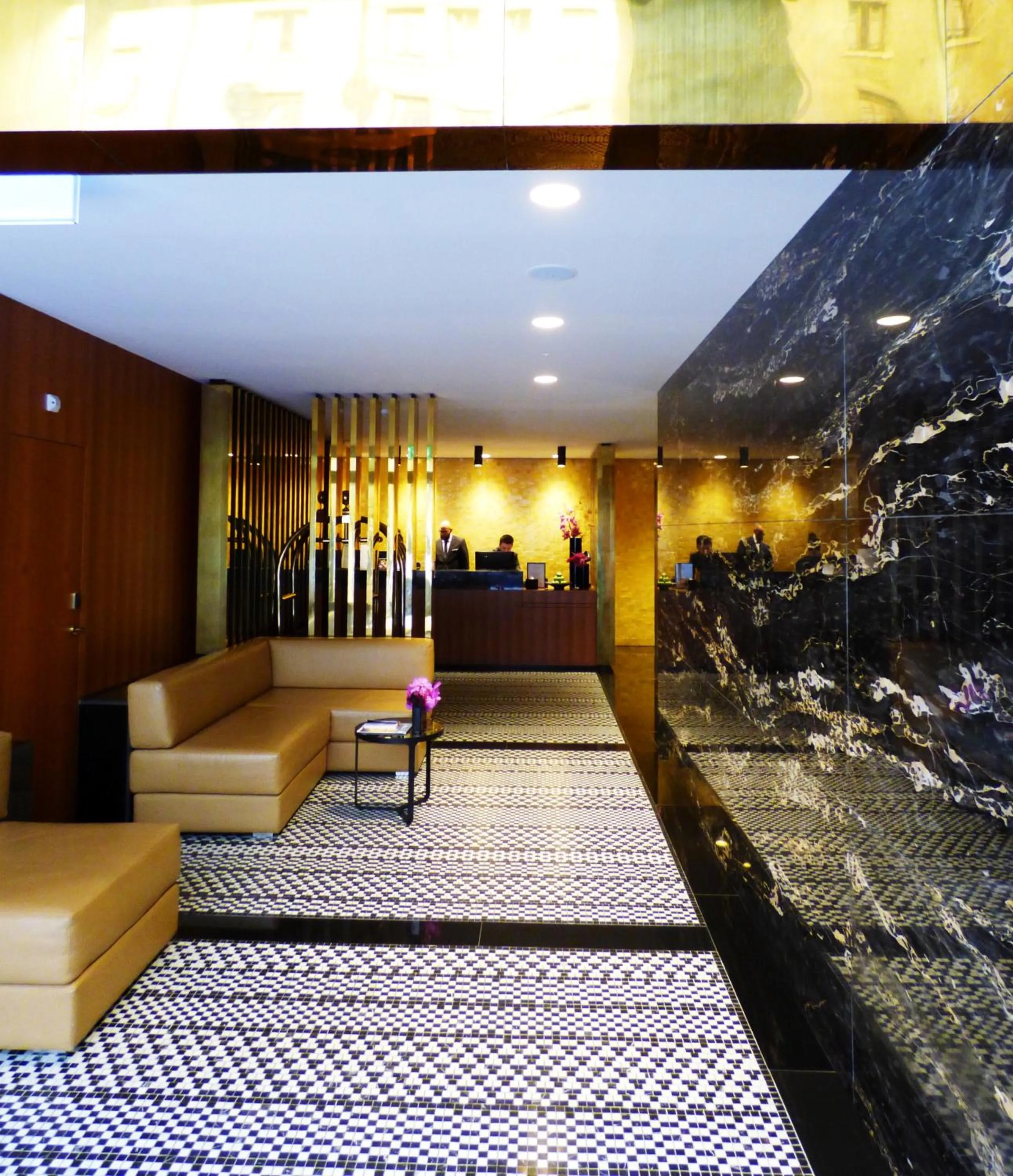 Lobby or reception in Fraser Suites Geneva - Serviced Apartments