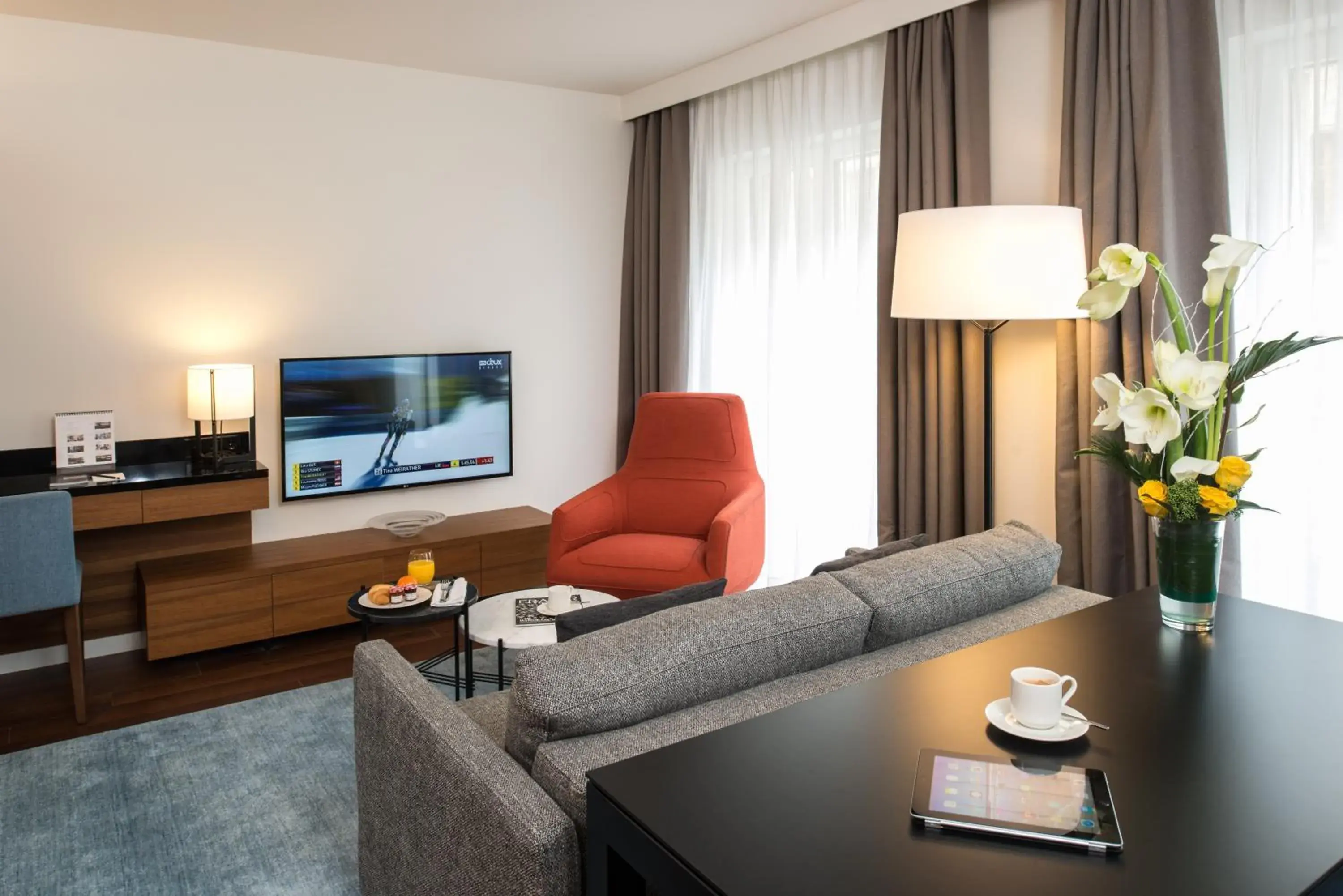 Living room in Fraser Suites Geneva - Serviced Apartments Living room in Fraser Suites Geneva - Serviced Apartments