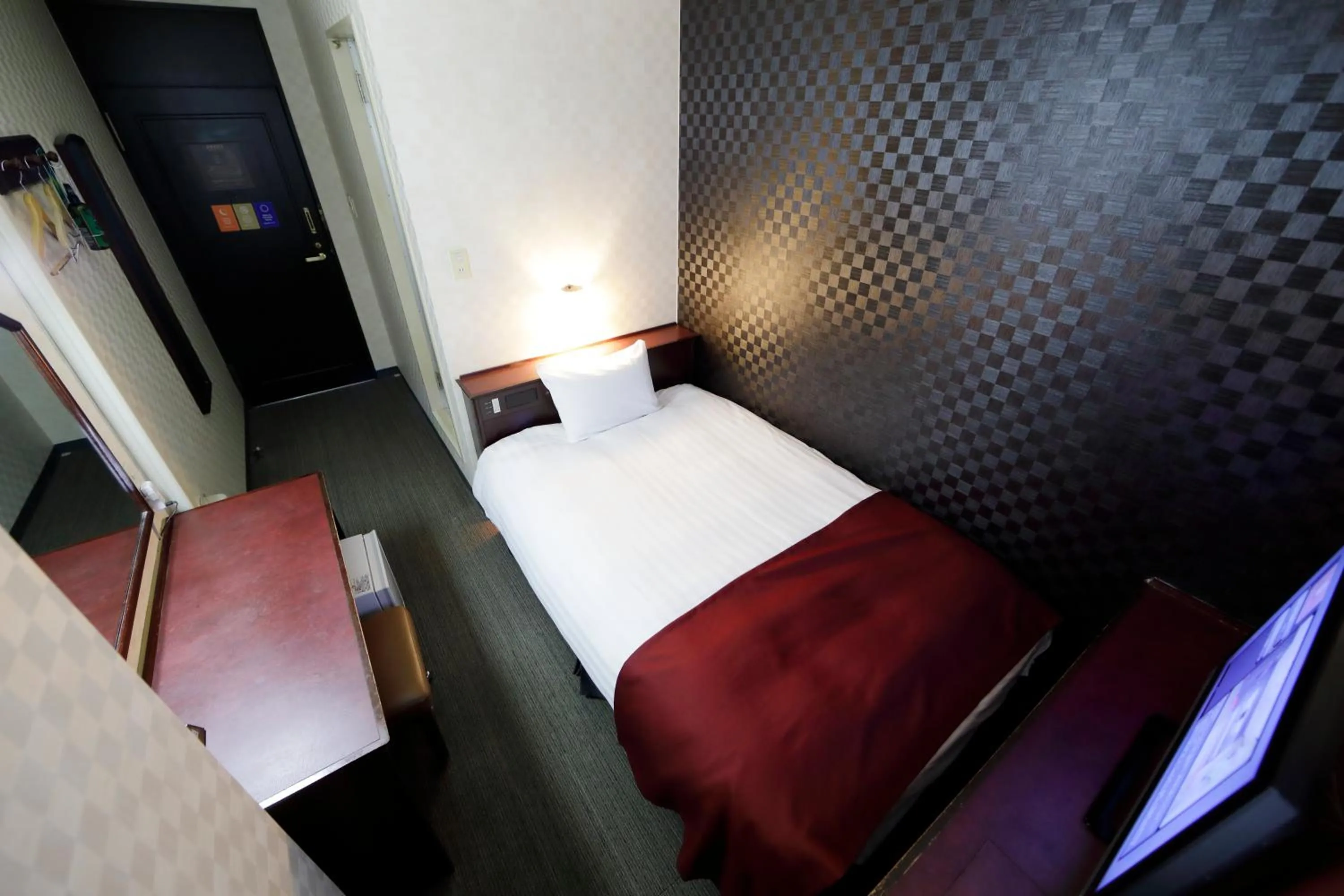 Bed in Pioland Hotel