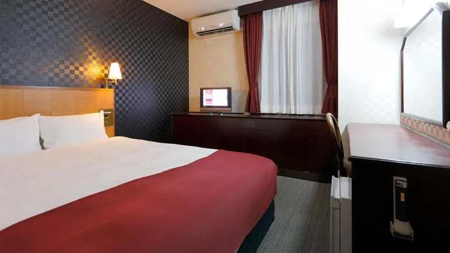 Bed in Pioland Hotel