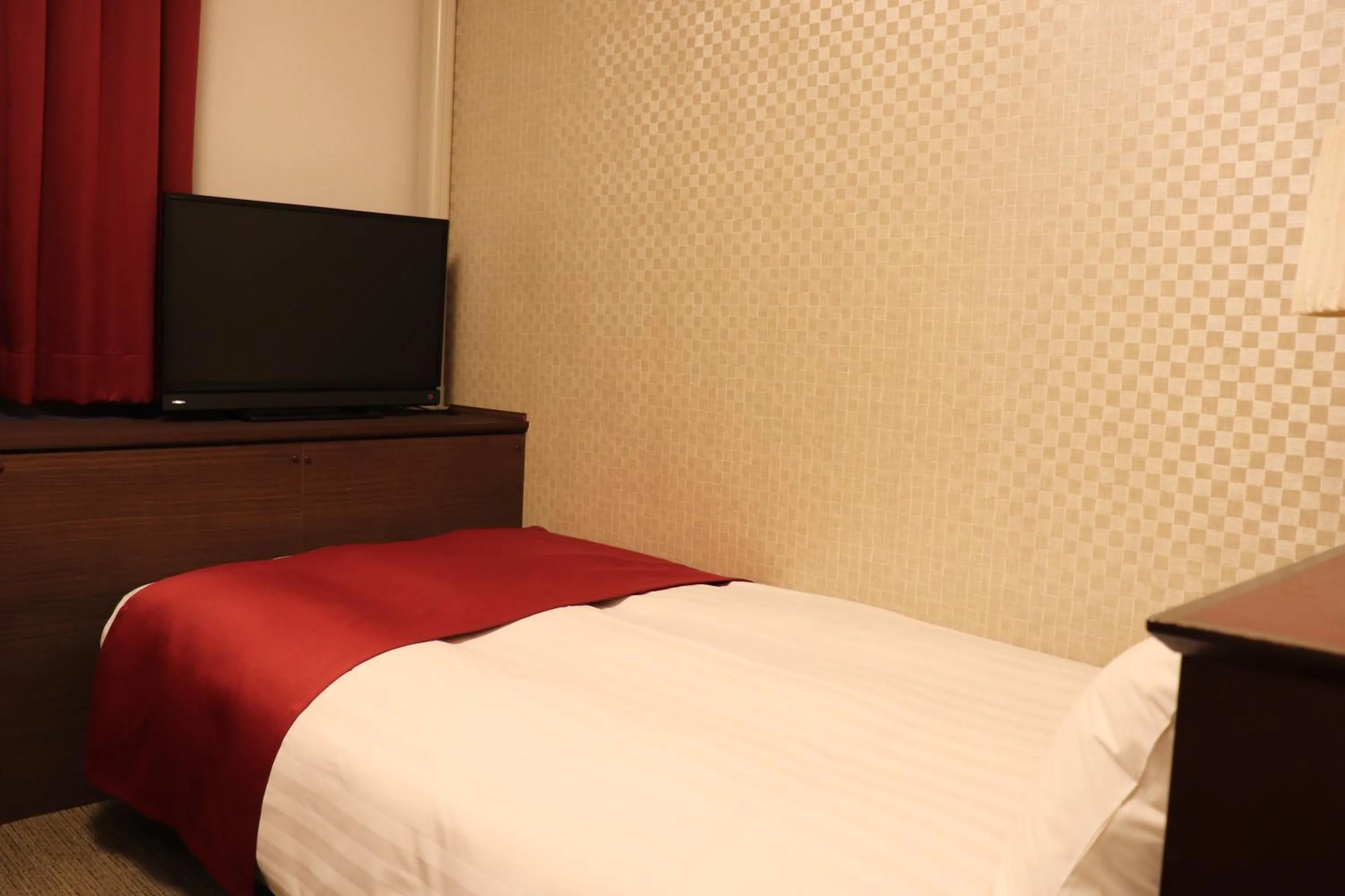 Bed in Pioland Hotel