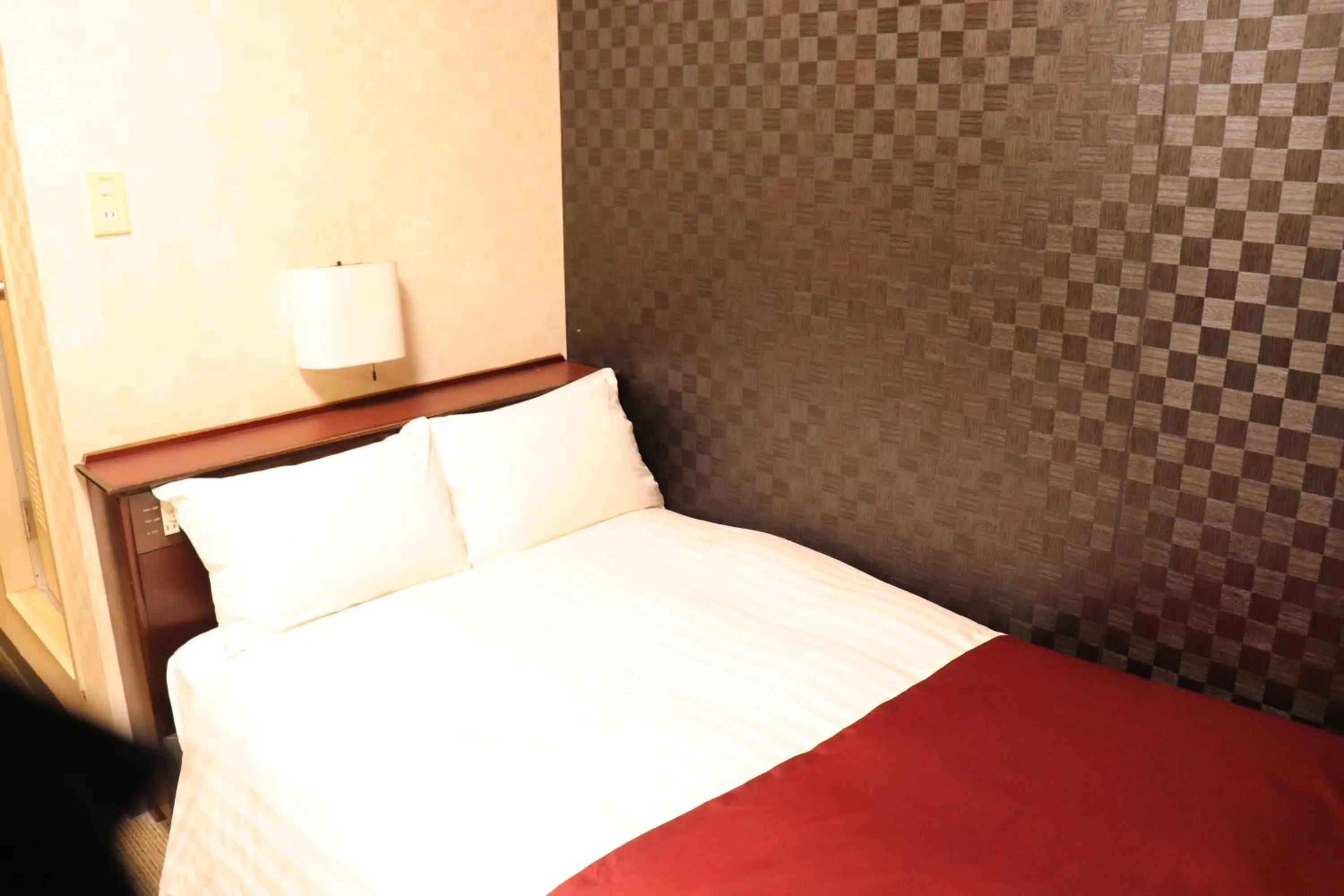 Bed in Pioland Hotel