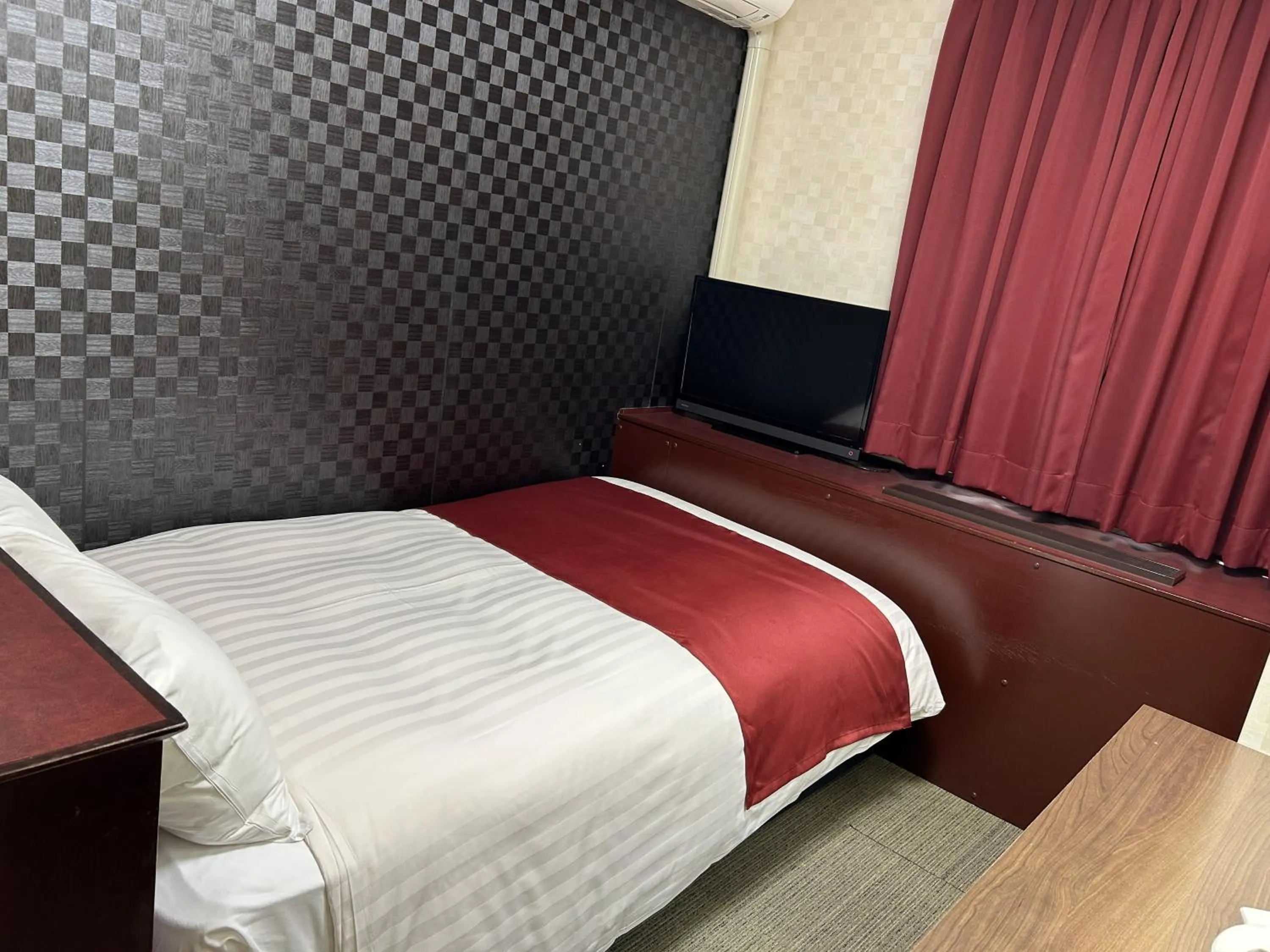 Bed in Pioland Hotel