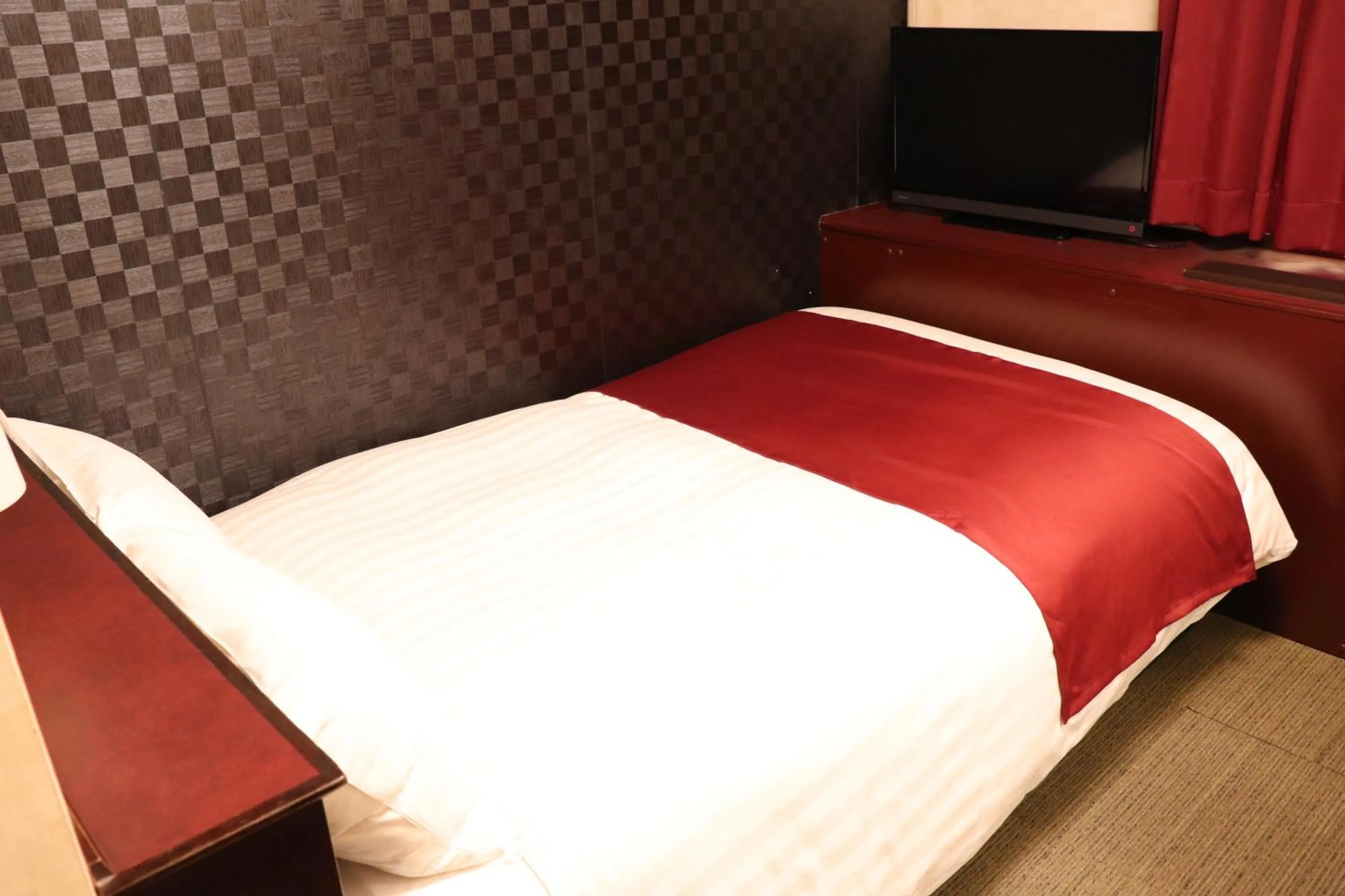 Bed in Pioland Hotel