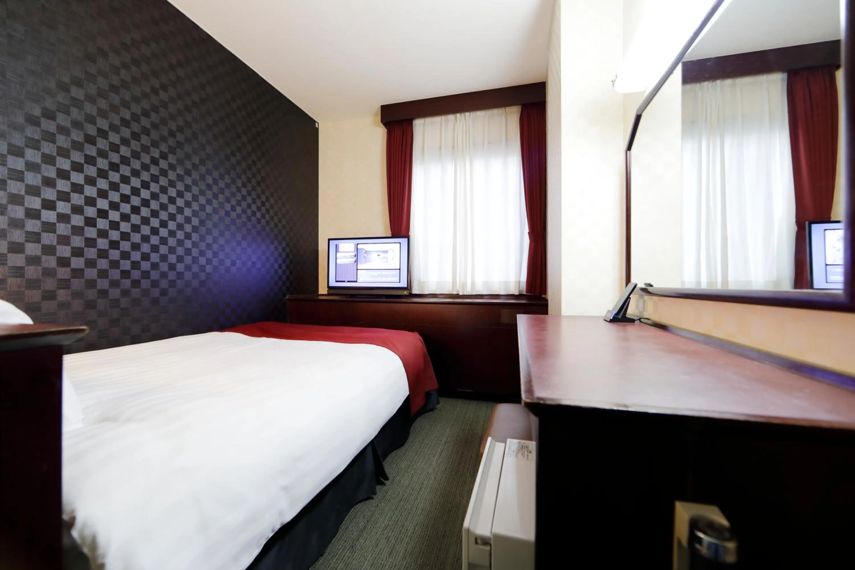 Bed in Pioland Hotel