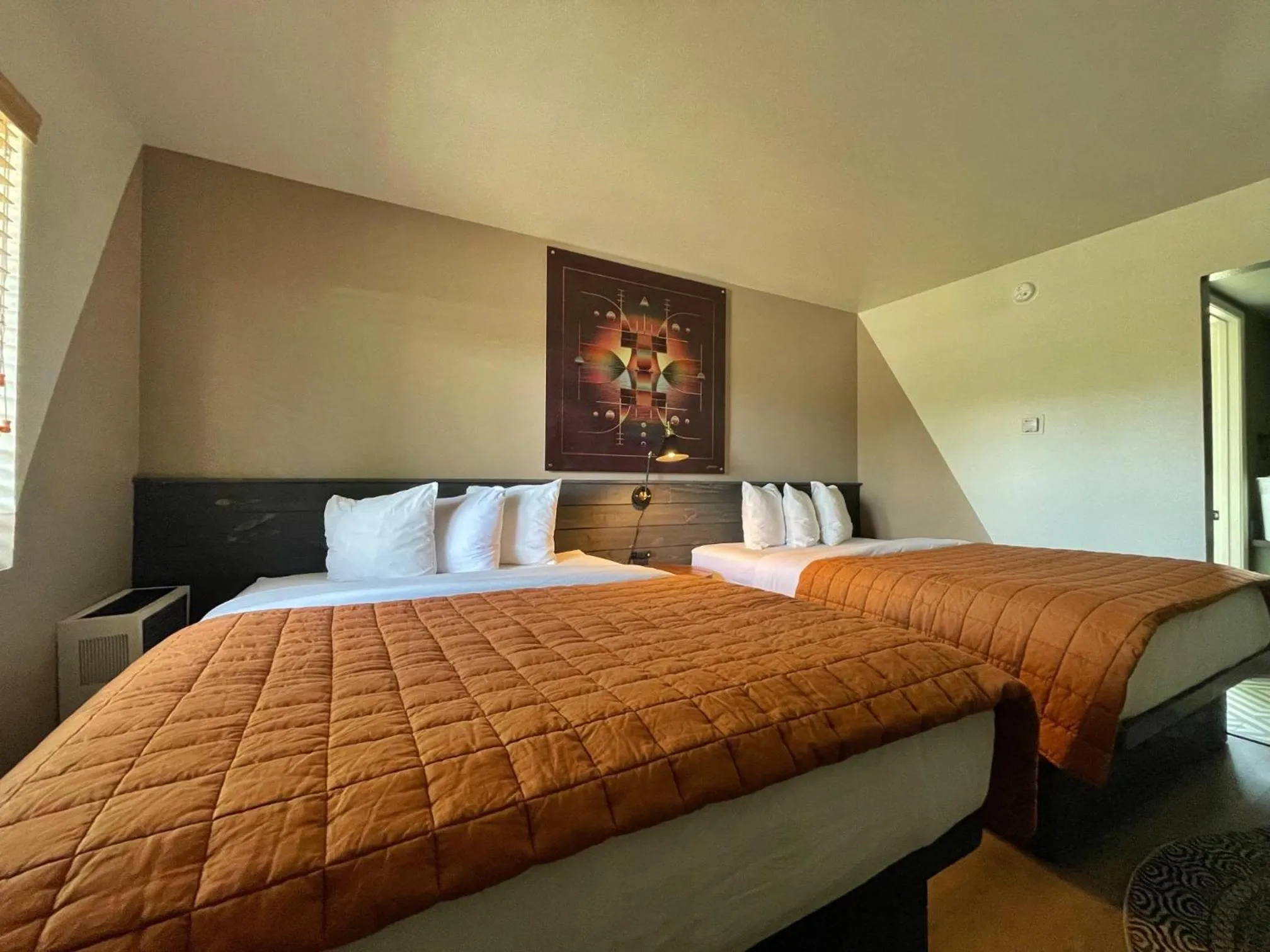 Bed in Sessions Retreat & Hotel