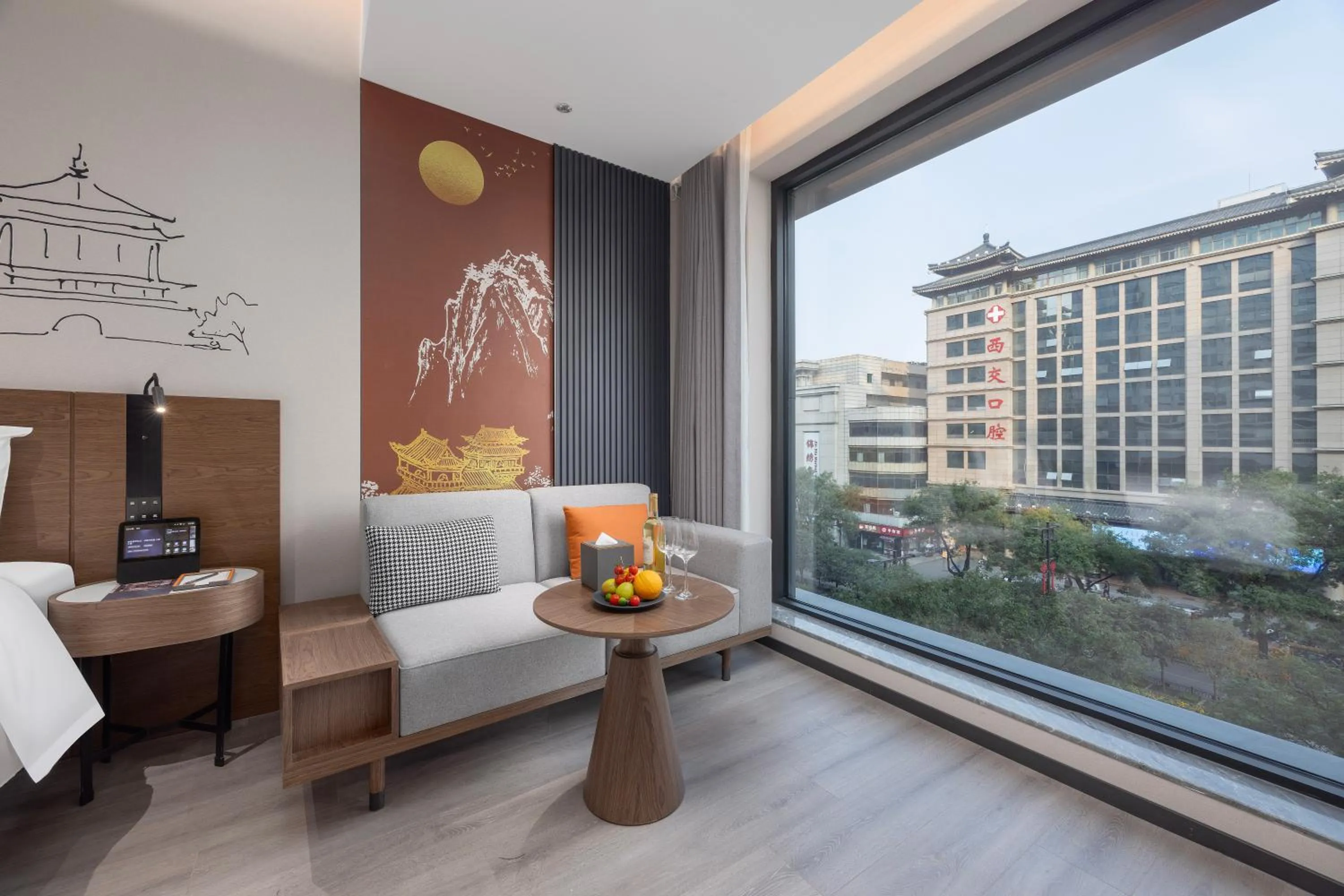 Seating area, Bed in UrCove by Hyatt Xi'an Bell Tower Huimin Street Hotel