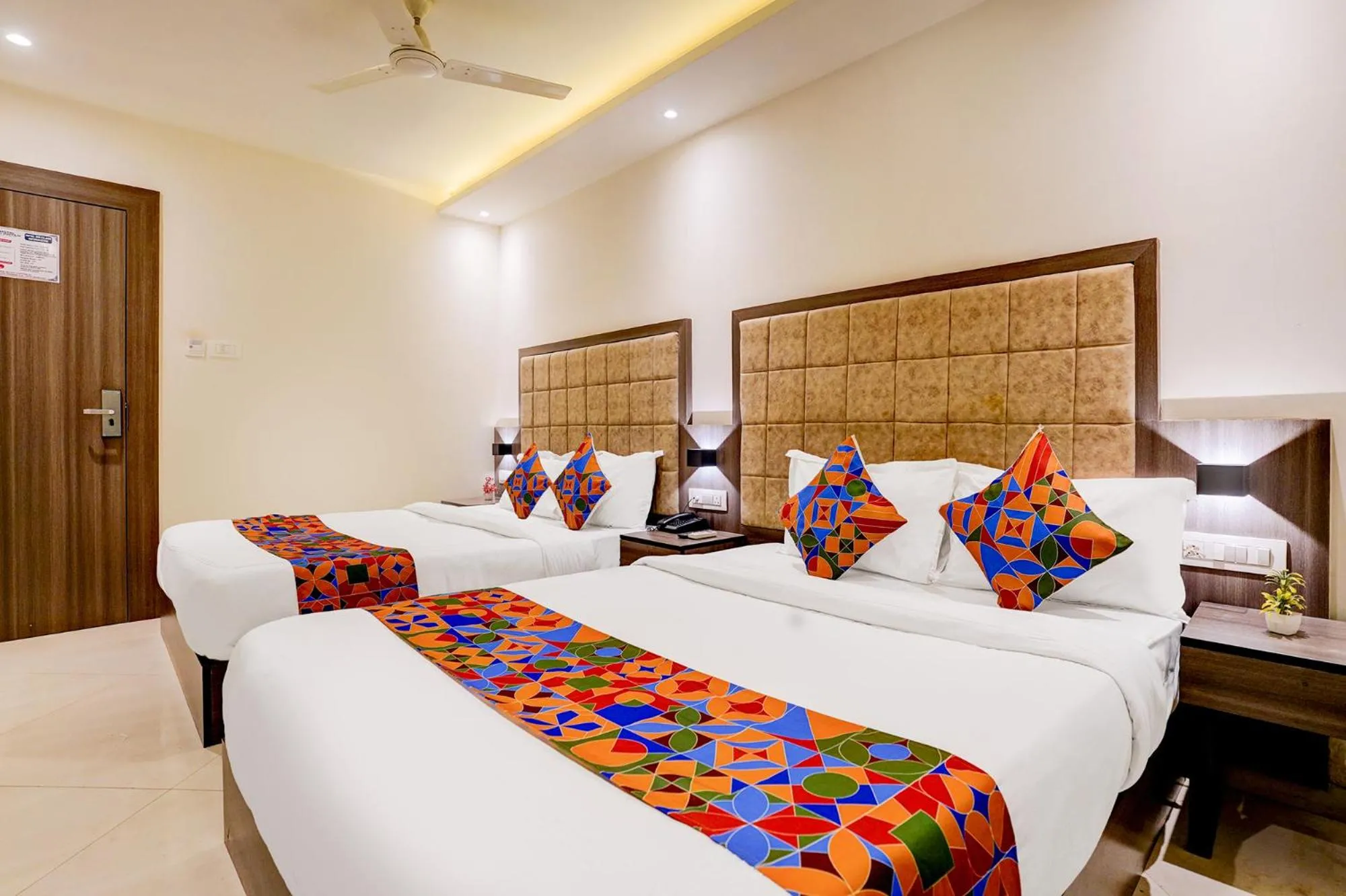 Bed in FabHotel Abrol Suites